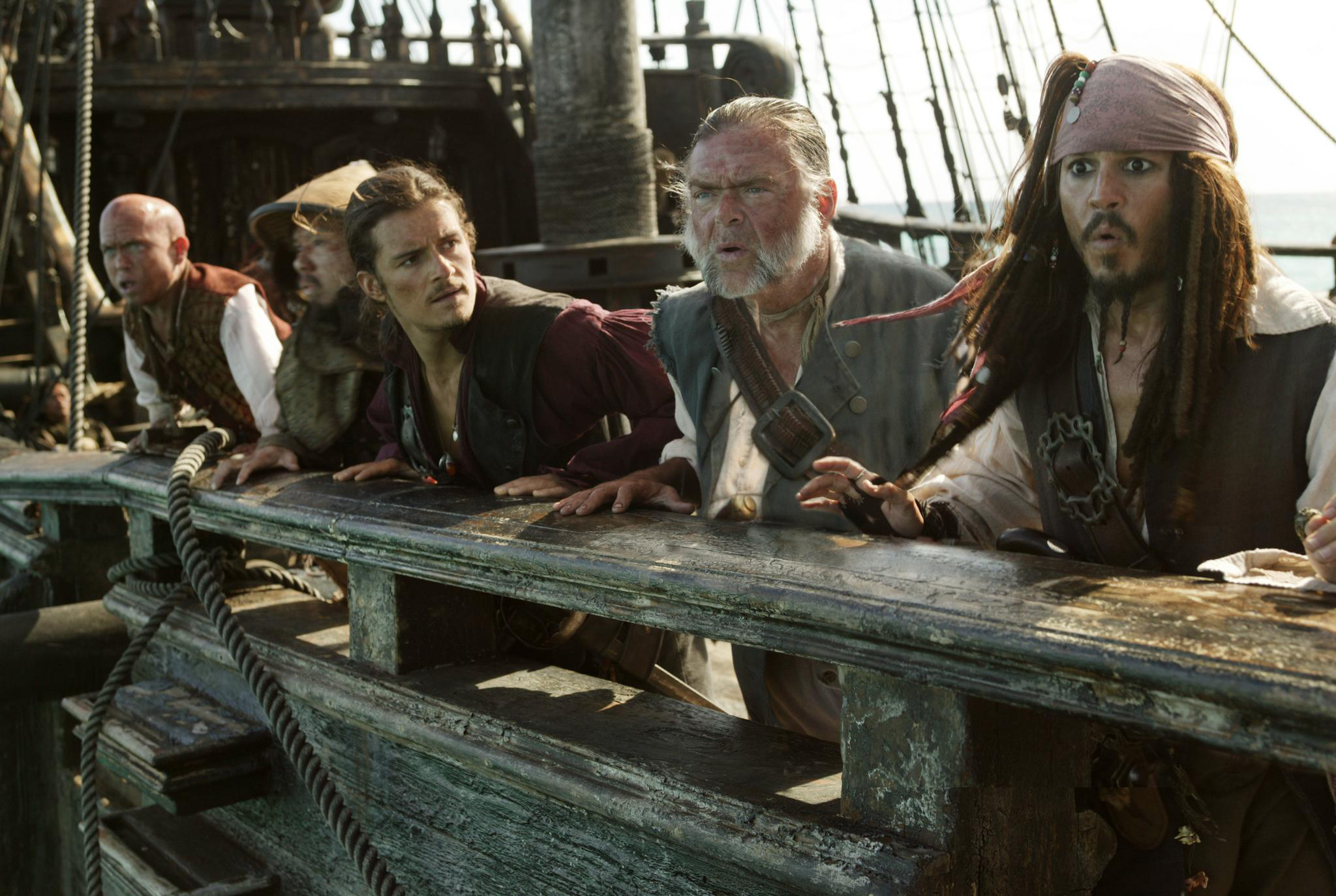 Will Turner and pirates on a ship deck HD Wallpaper