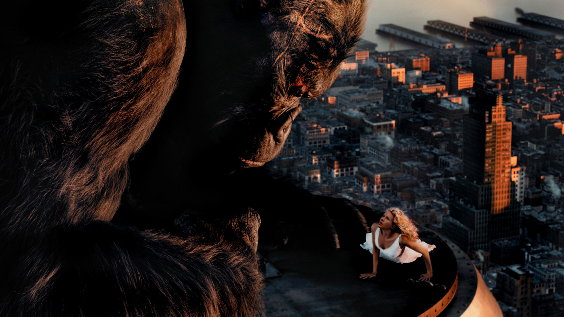 King Kong on a skyscraper with a woman HD Wallpaper