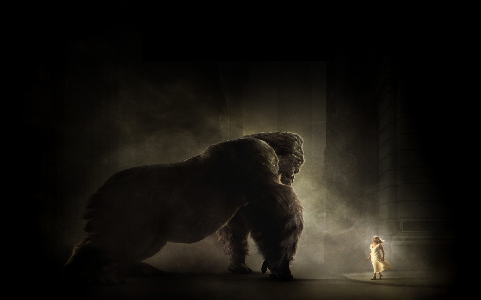 King Kong facing a woman in a dark setting HD Wallpaper