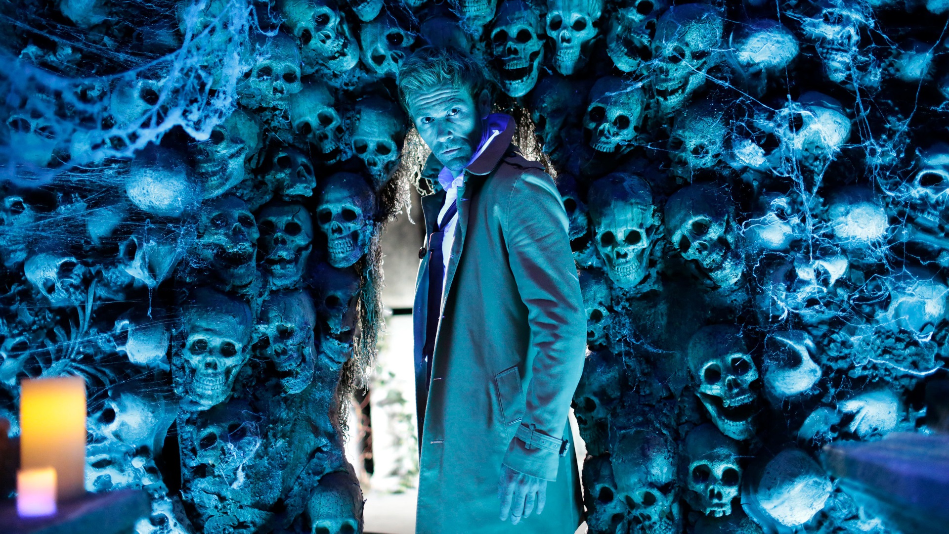 John Constantine surrounded by skulls HD Wallpaper