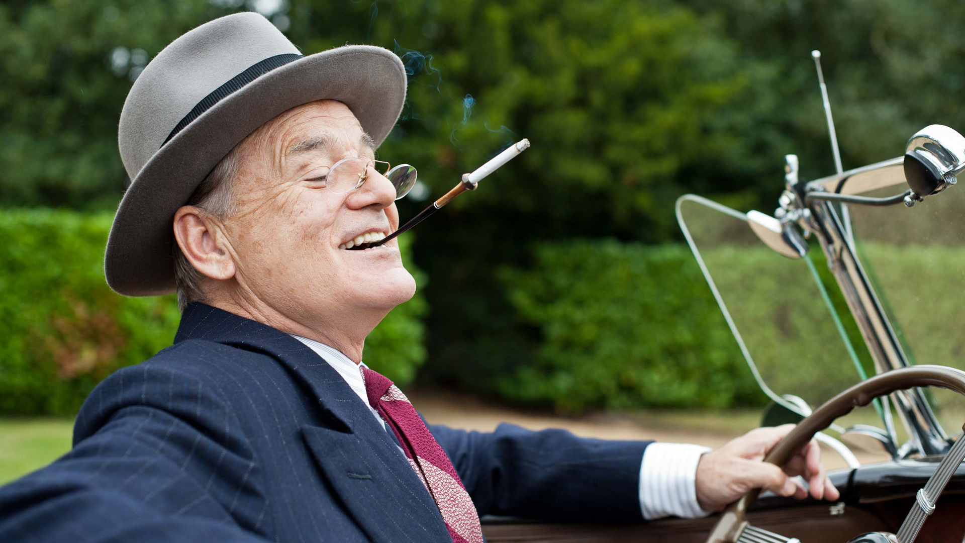 Bill Murray in a car smoking a cigarette holder HD Wallpaper