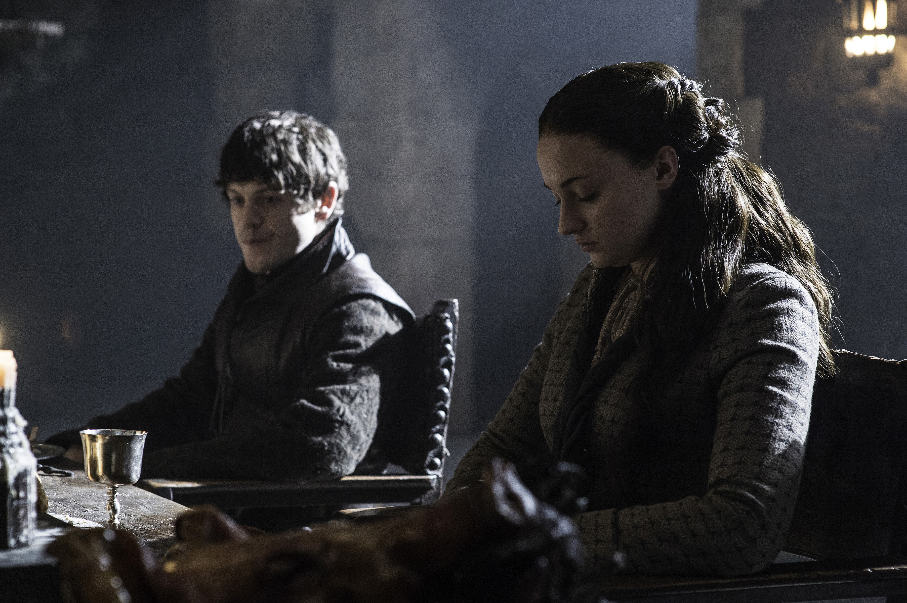 Ramsay Bolton and Sansa Stark at a table HD Wallpaper