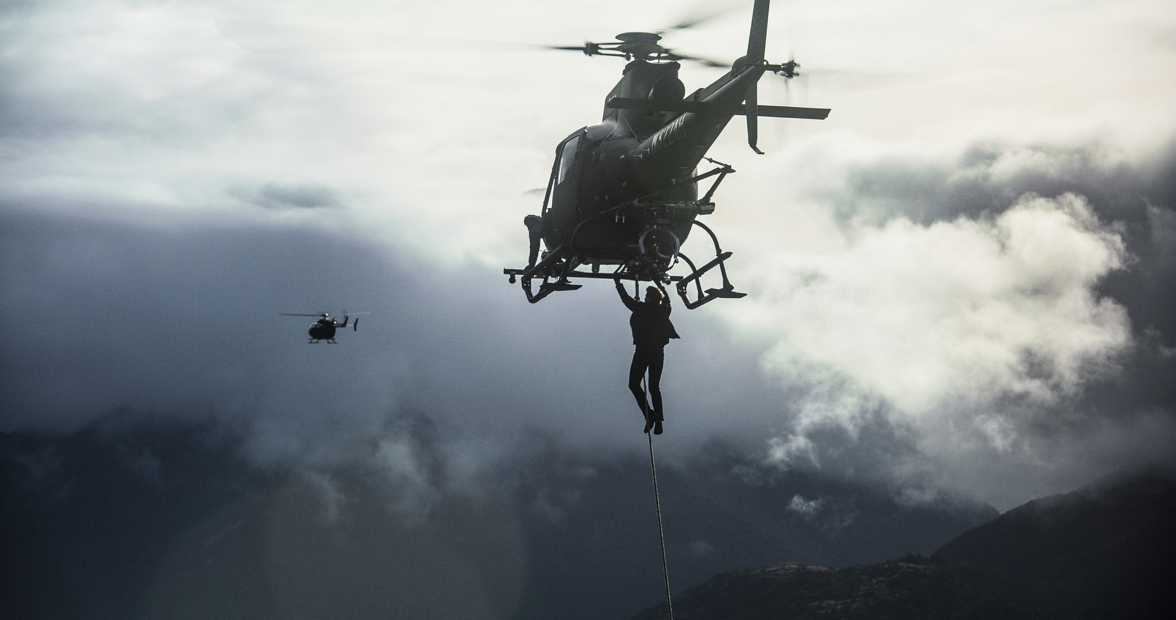 Ethan Hunt hanging from a helicopter HD Wallpaper