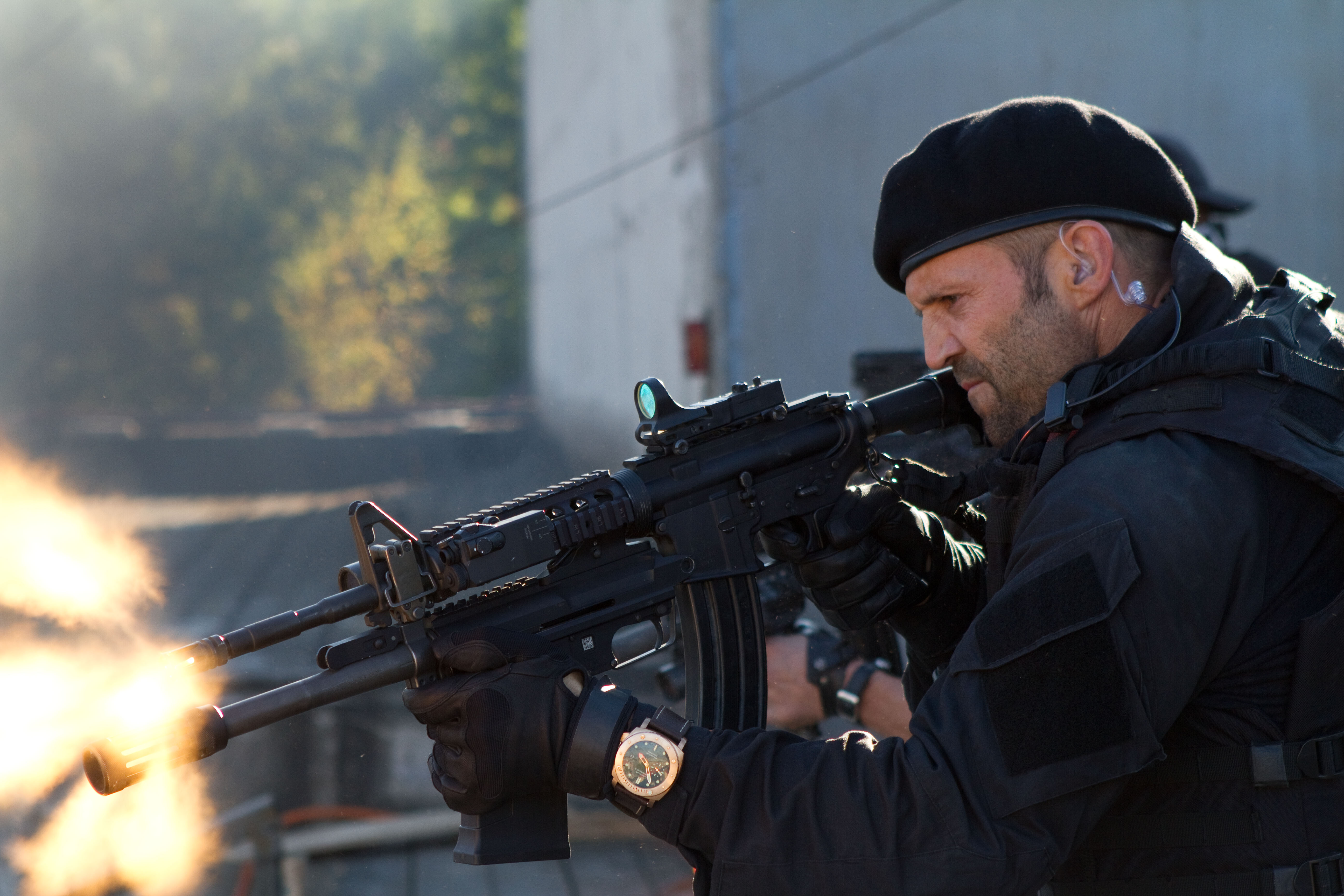 Lee Christmas firing an assault rifle HD Wallpaper