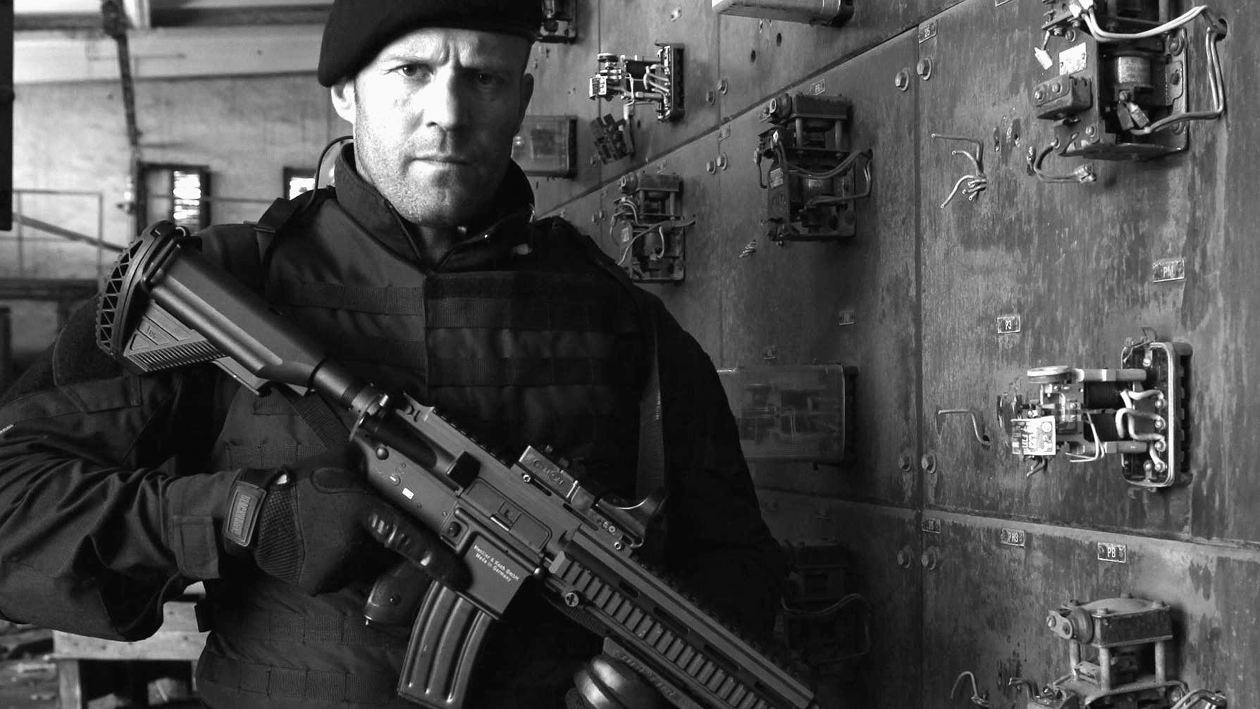 Lee Christmas holding a rifle HD Wallpaper