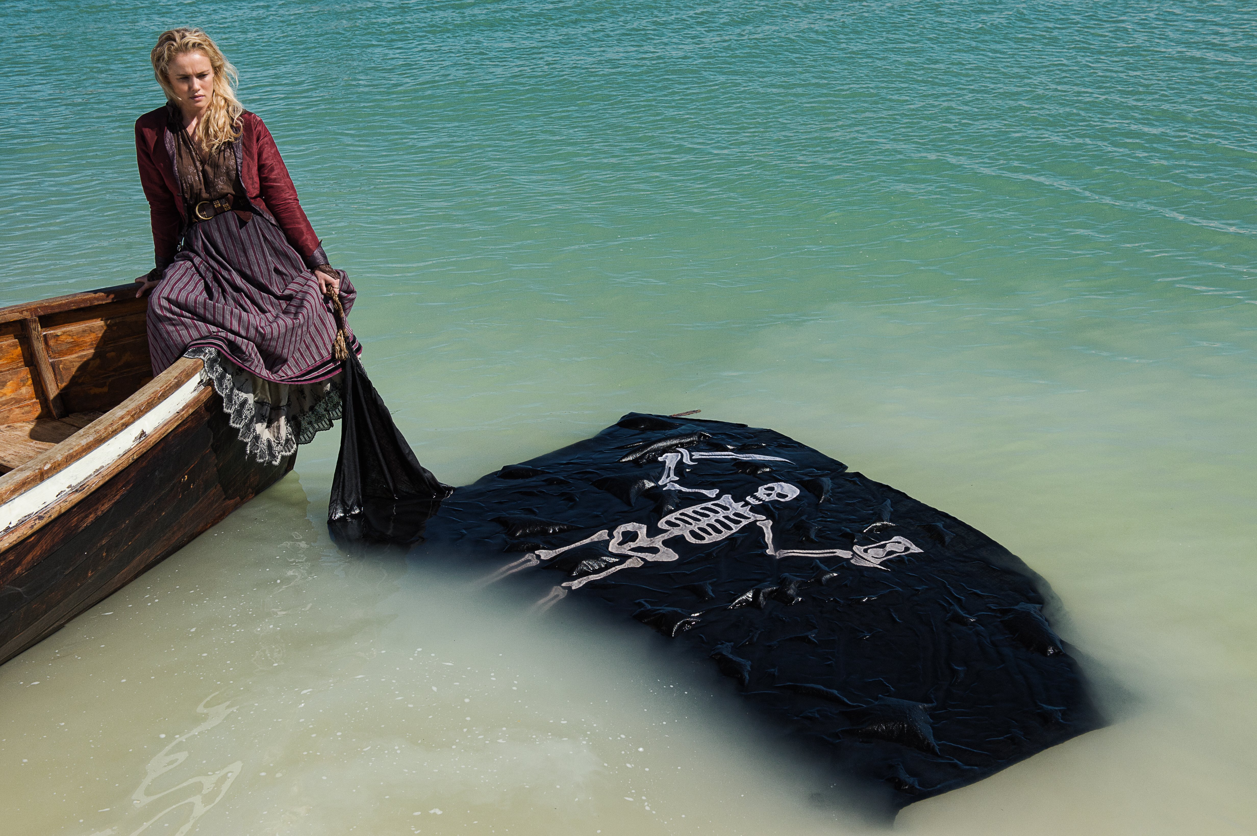 Eleanor Guthrie in a boat with a pirate flag HD Wallpaper