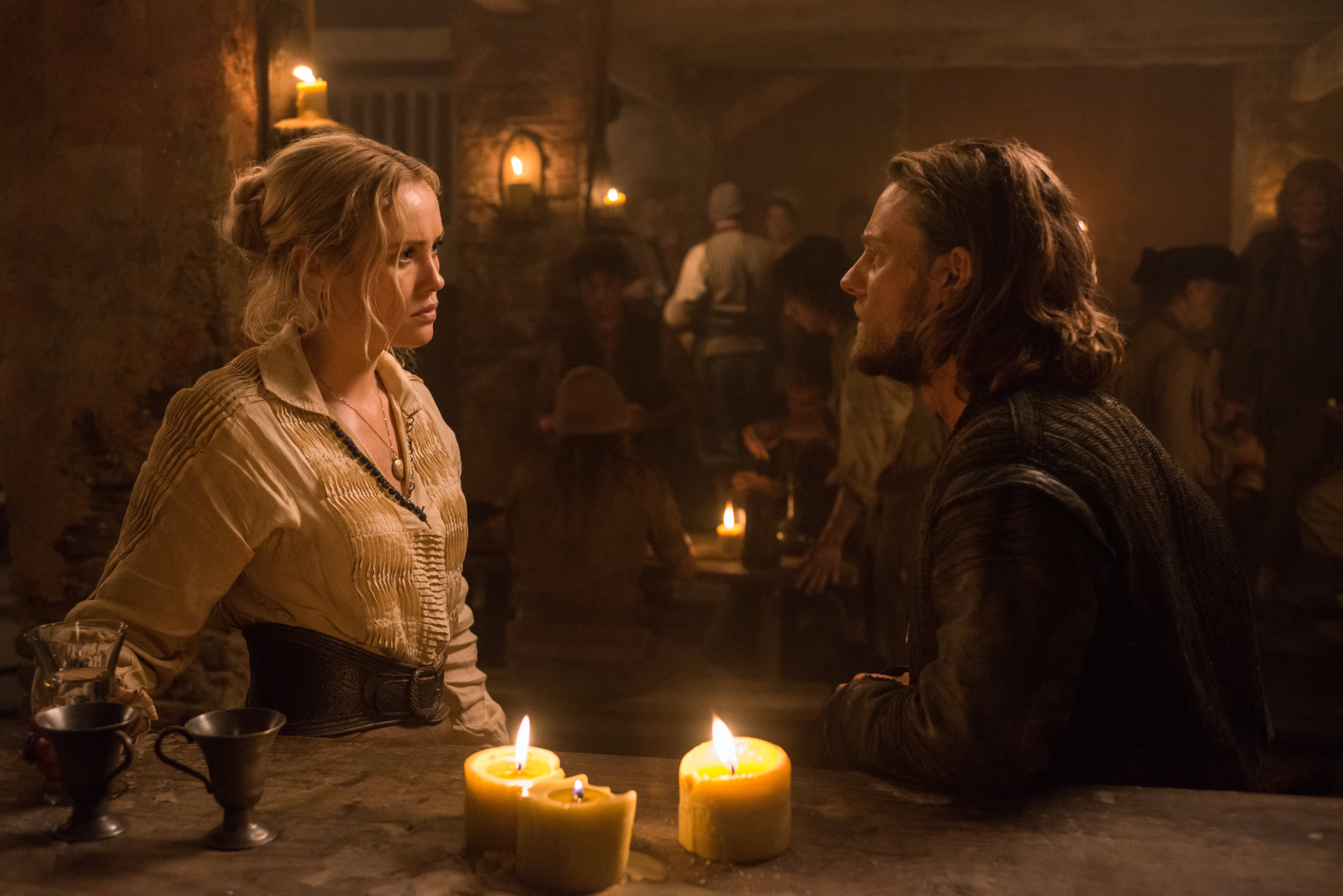 Eleanor Guthrie in a dimly lit tavern HD Wallpaper