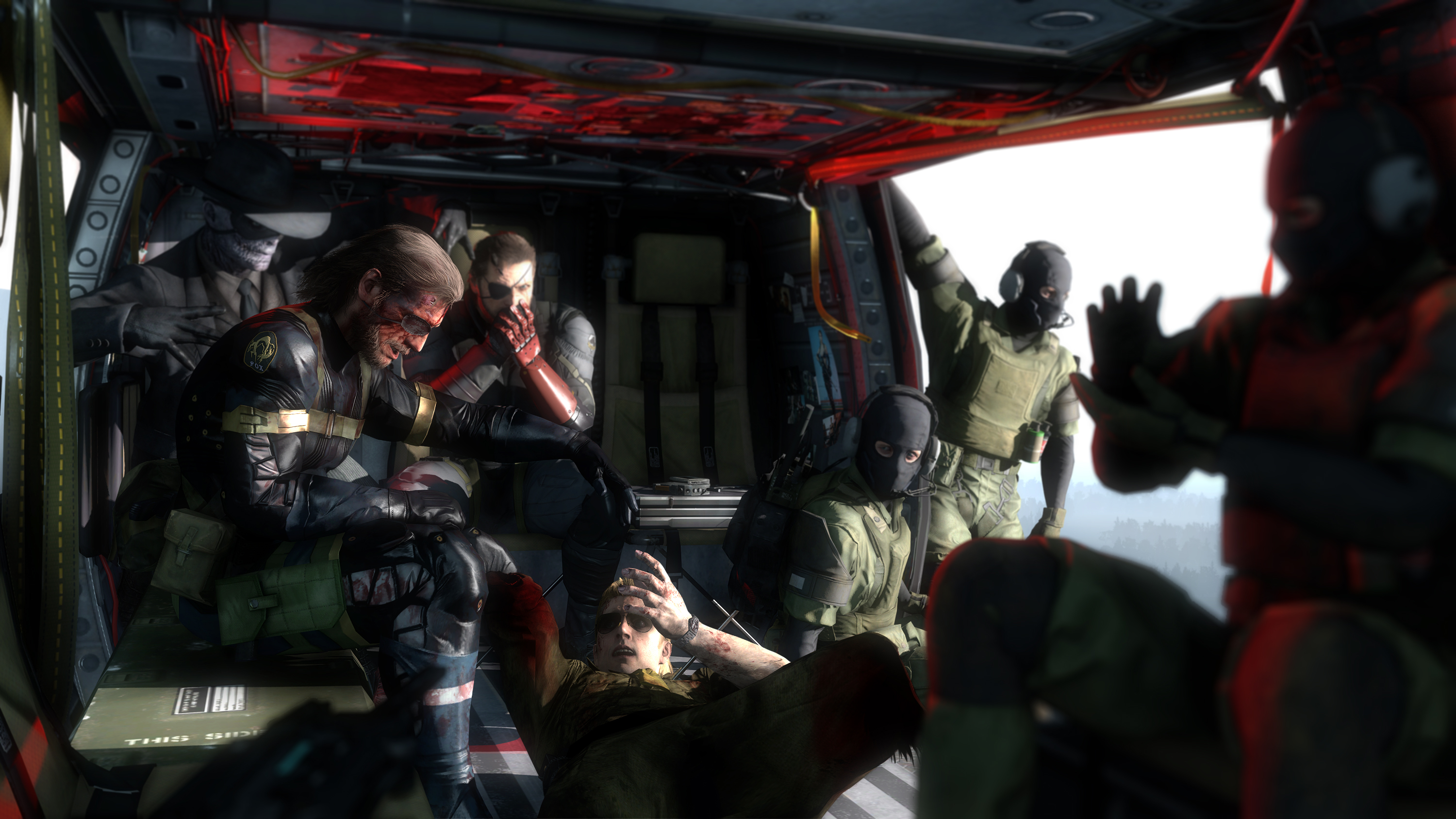 Big Boss and soldiers in a helicopter HD Wallpaper