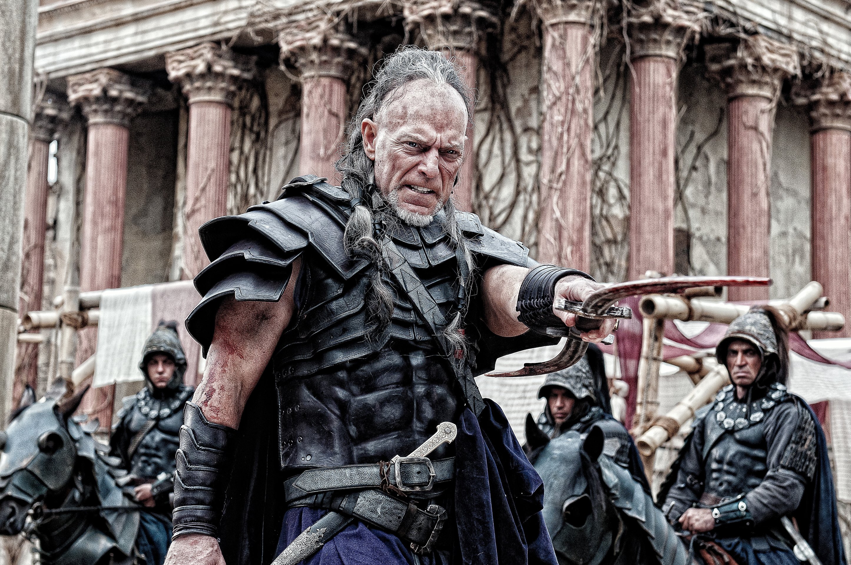 Man in armor with sword from Conan HD Wallpaper