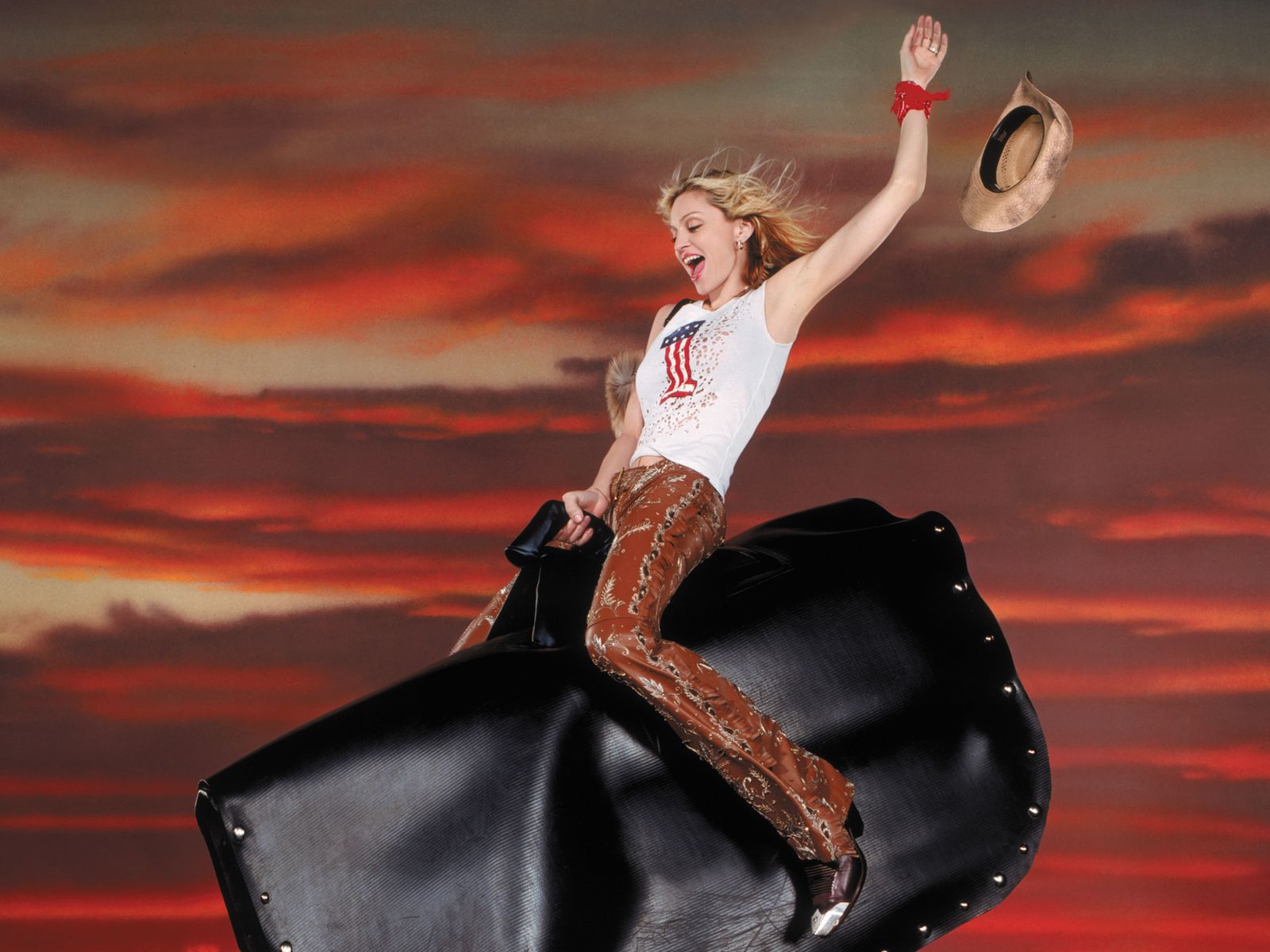 Madonna on a mechanical bull HD Wallpaper