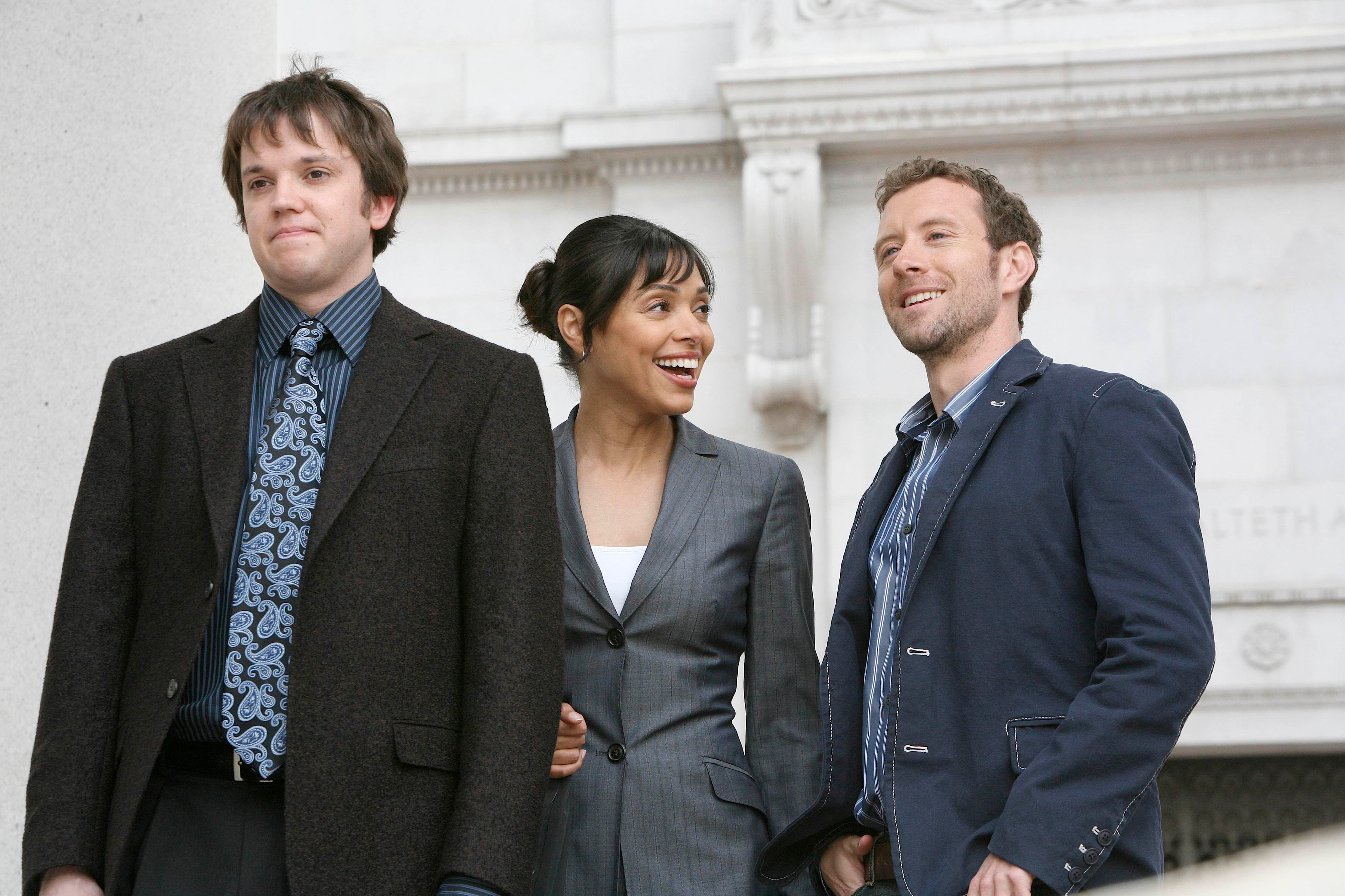 Camille Saroyan and two men standing outside HD Wallpaper