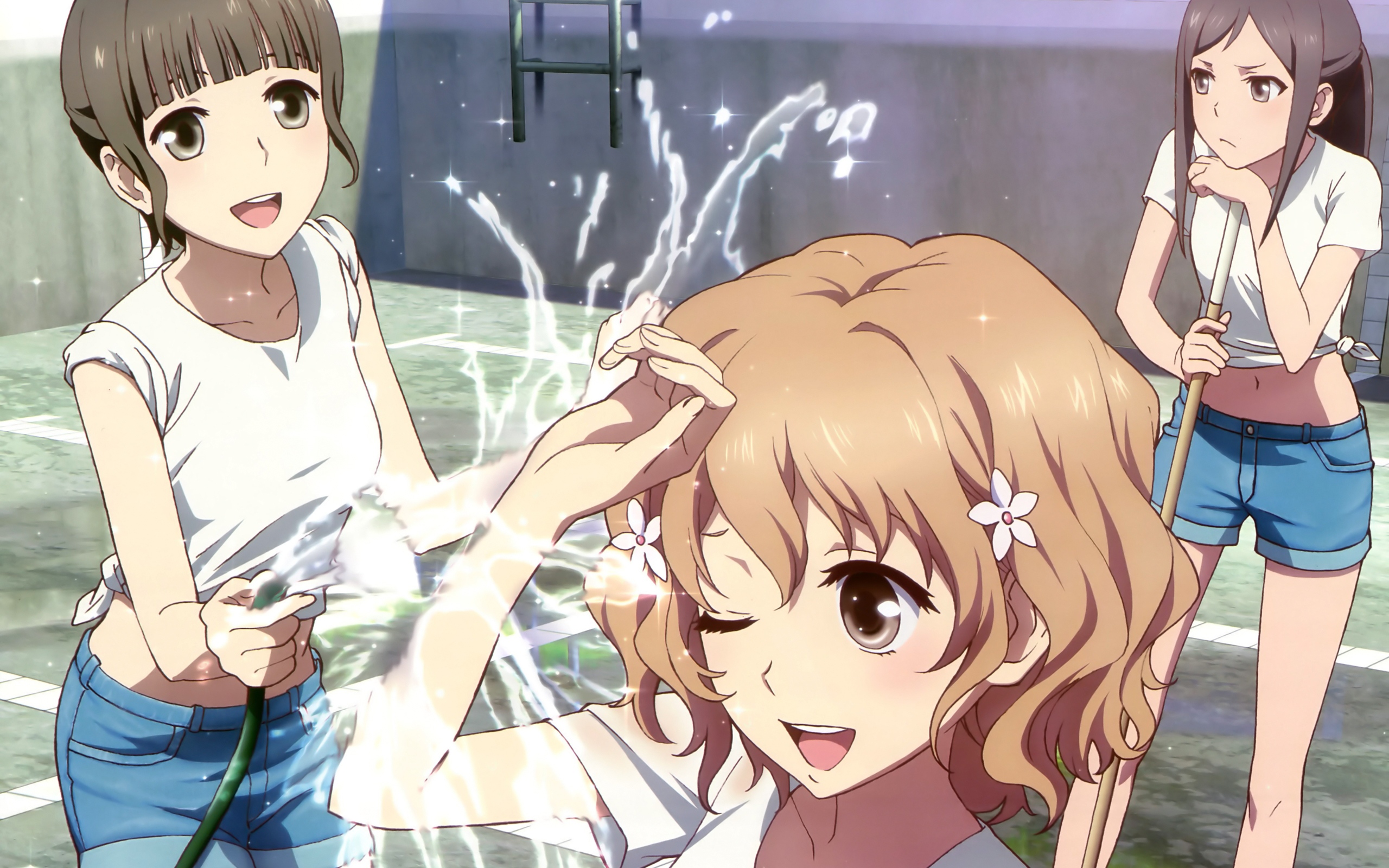 Three girls playing with a hose HD Wallpaper
