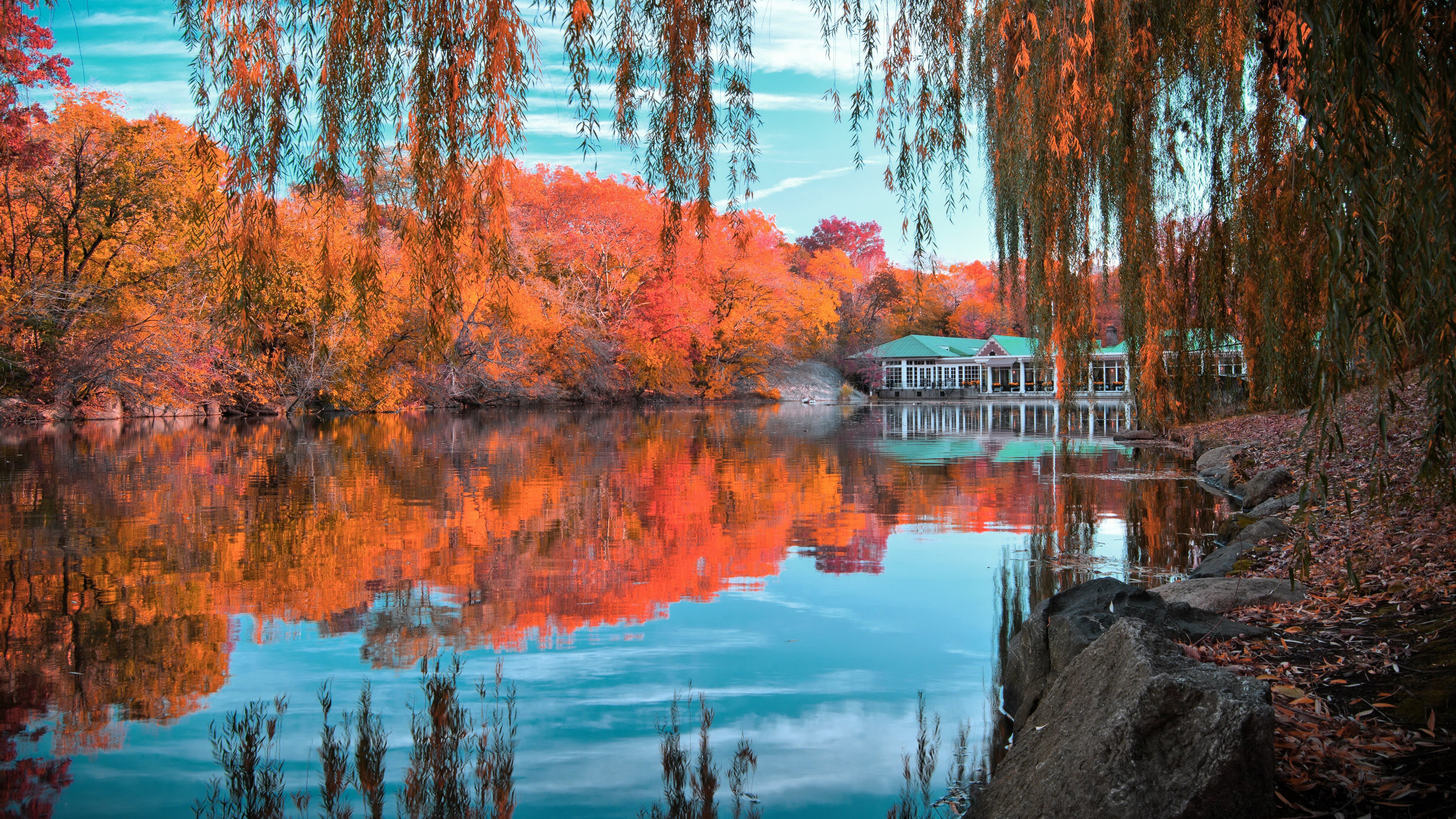 Autumn lake with reflections and a building HD Wallpaper