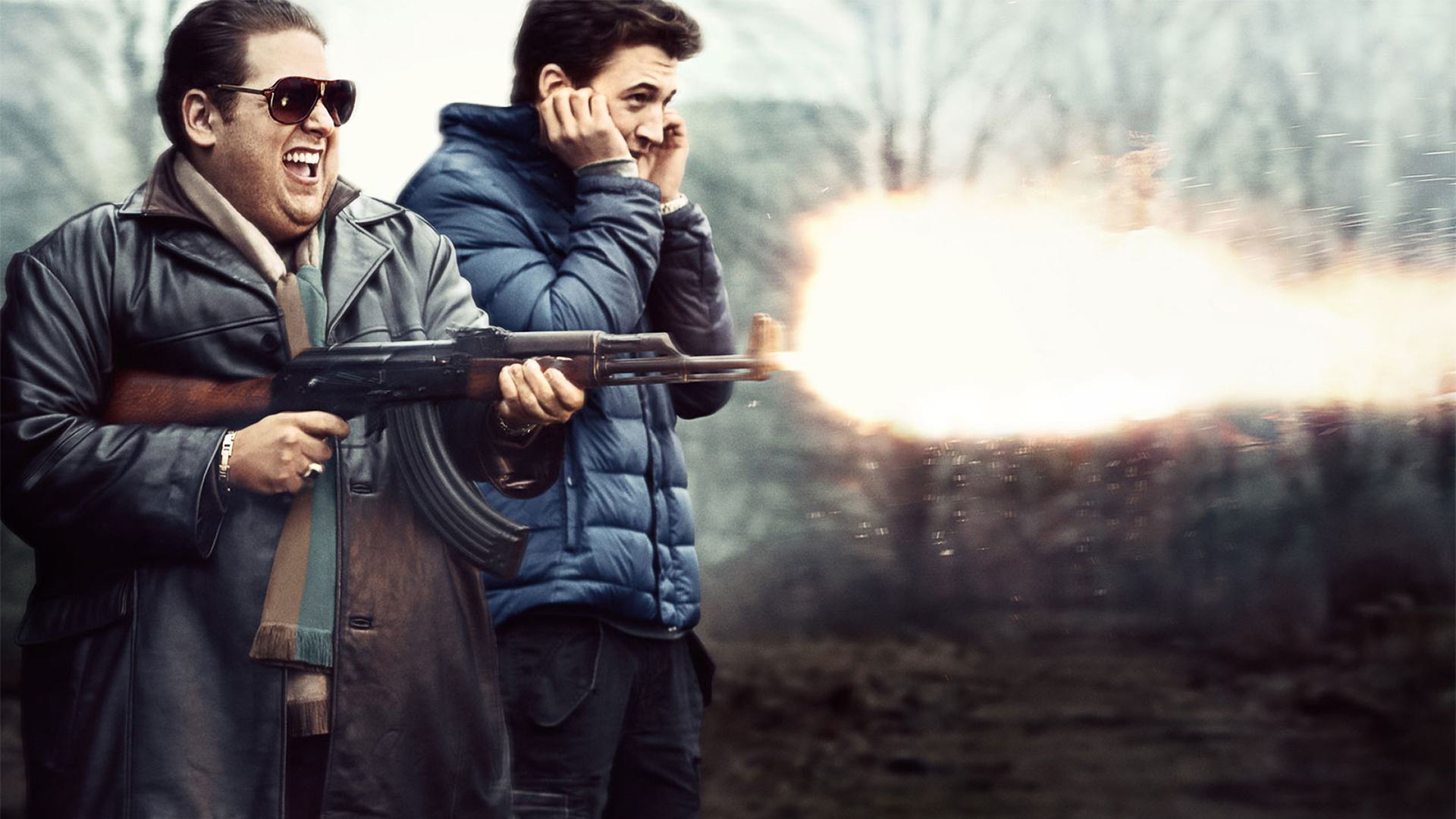 Jonah Hill firing an AK-47 HD Wallpaper