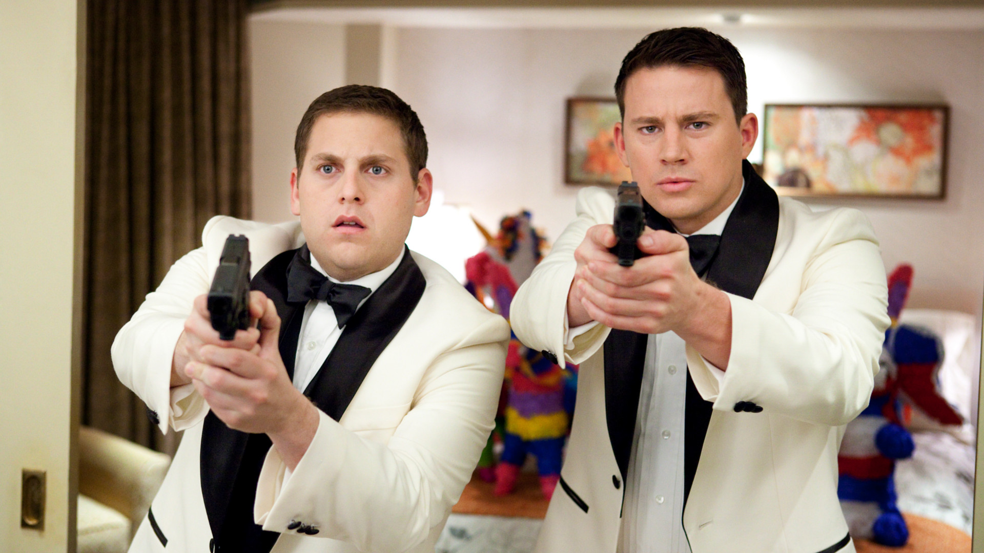 Jonah Hill and Channing Tatum in Tuxedos Holding Guns HD Wallpaper