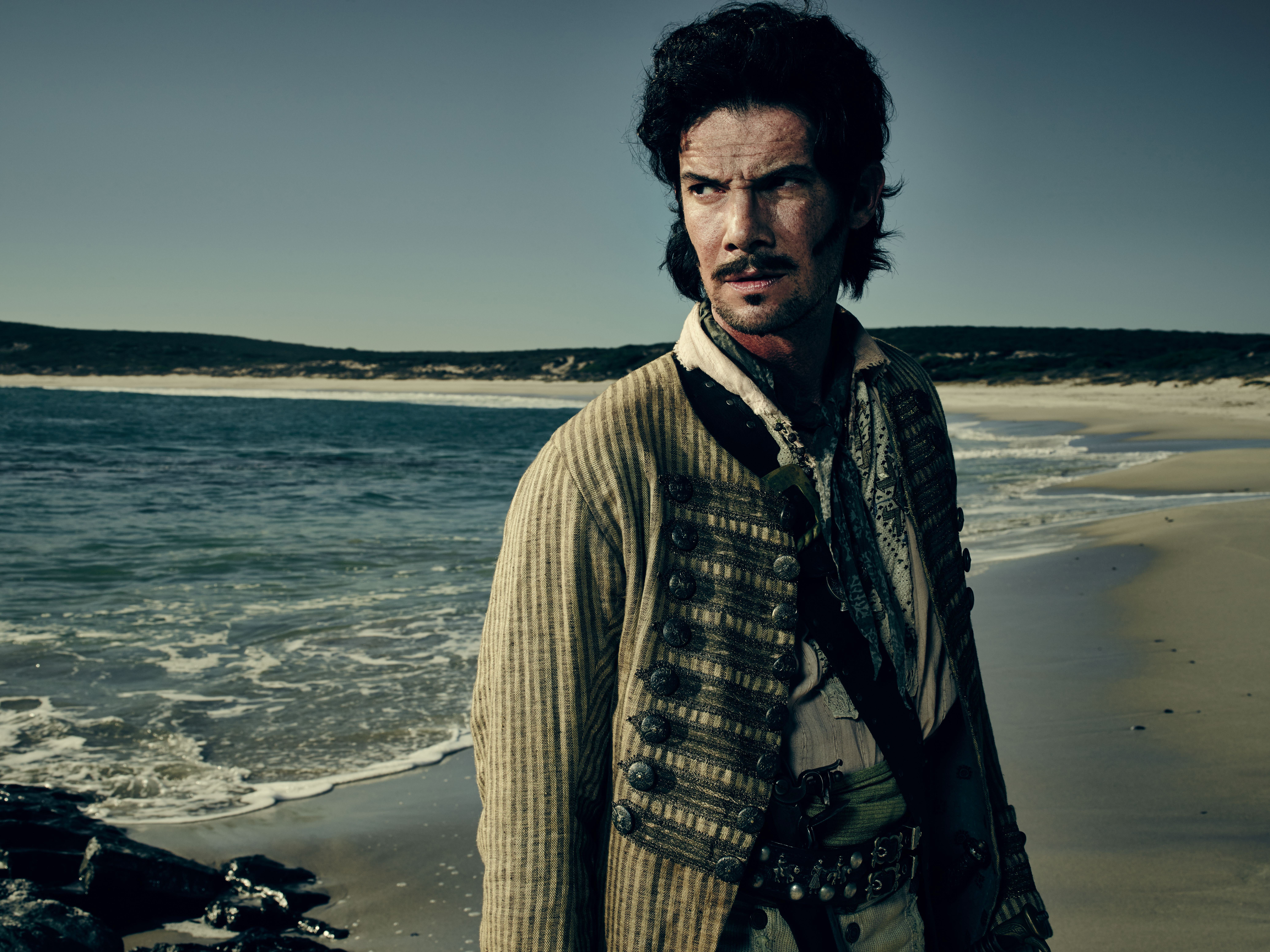 Jack Rackham on a beach HD Wallpaper