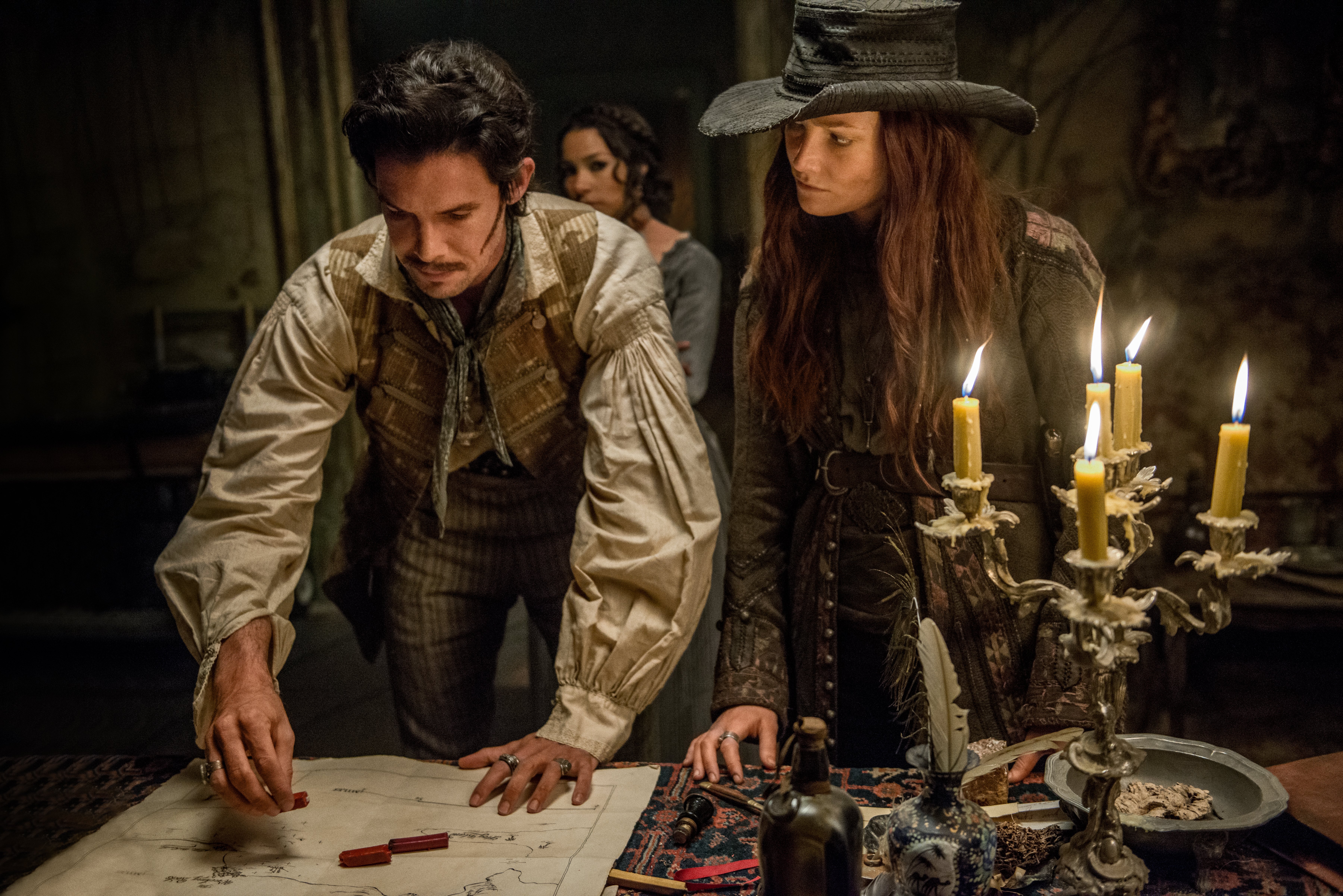 Jack Rackham and companions examining a map HD Wallpaper