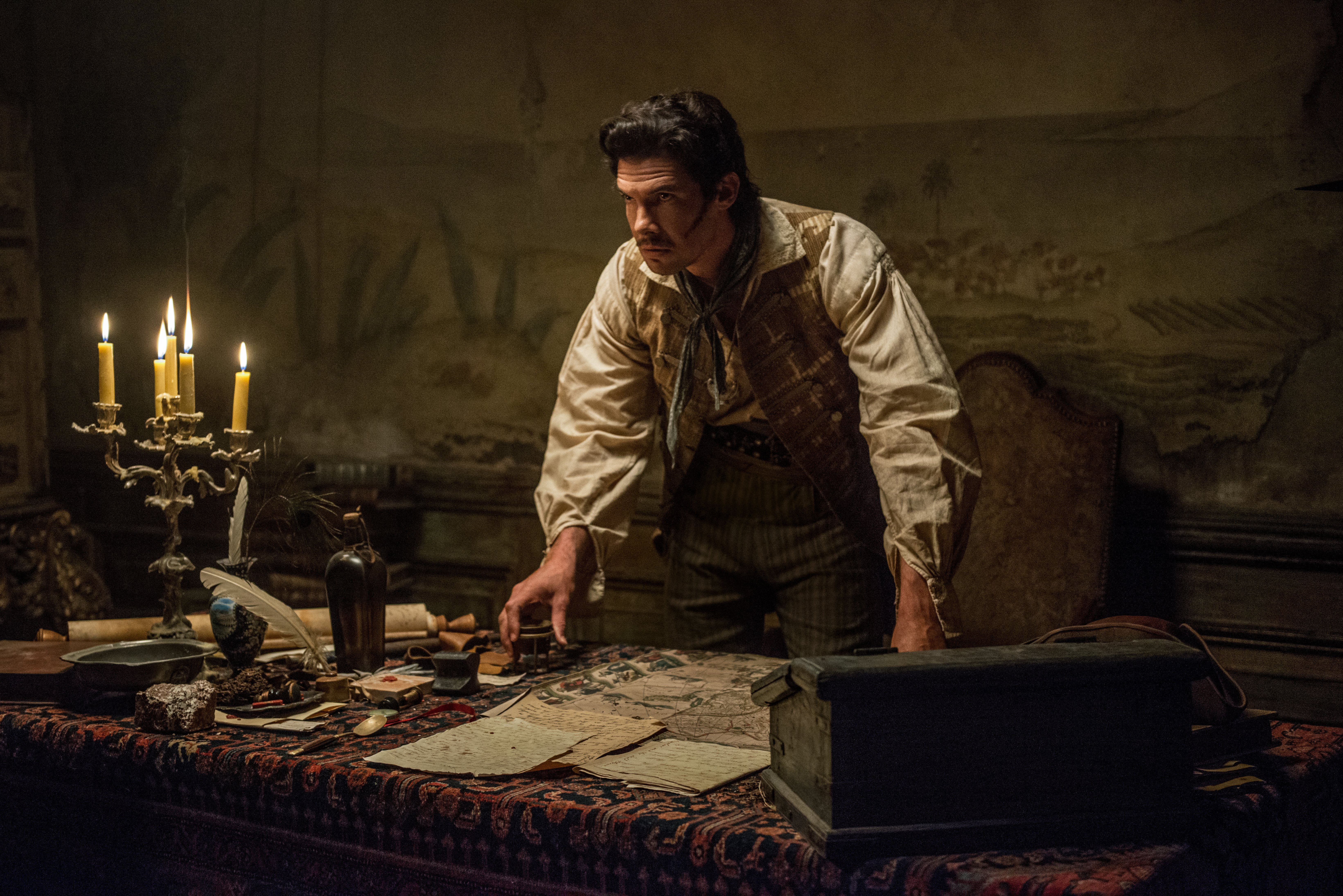 Jack Rackham in a dimly lit room HD Wallpaper