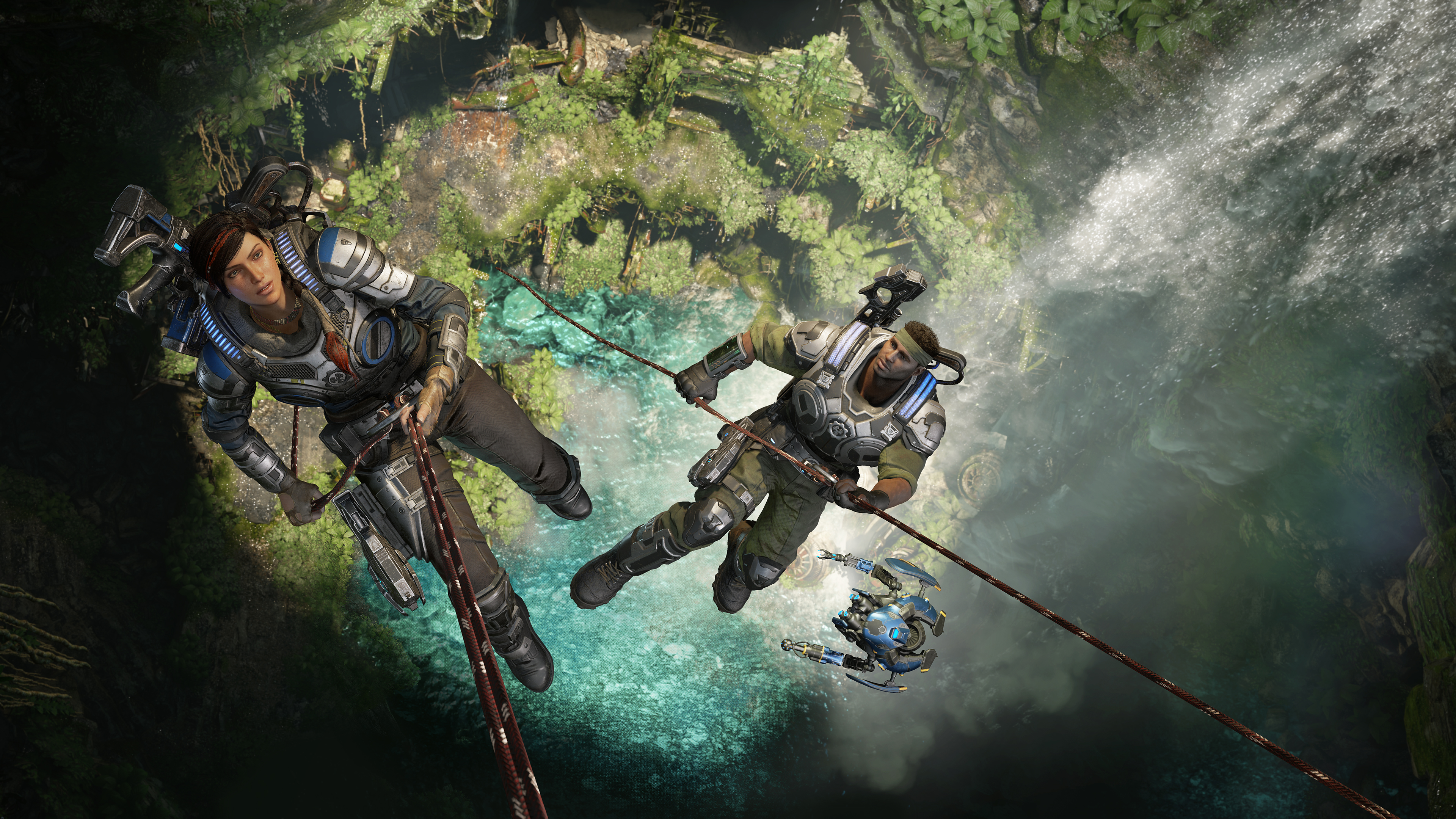 Kait Diaz and JD Fenix rappelling in a jungle chasm HD Wallpaper