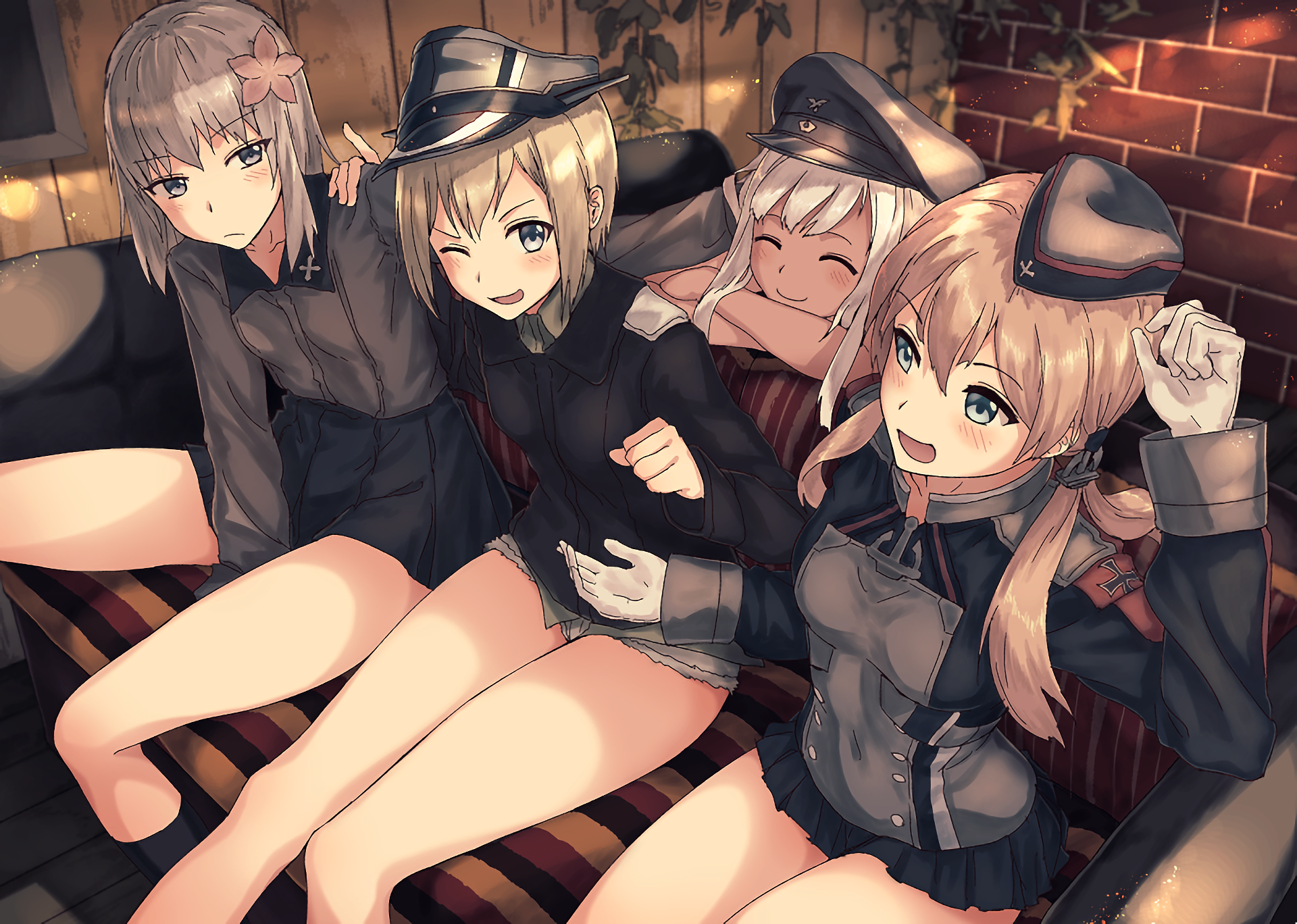 Four girls in military uniforms sitting on a couch HD Wallpaper