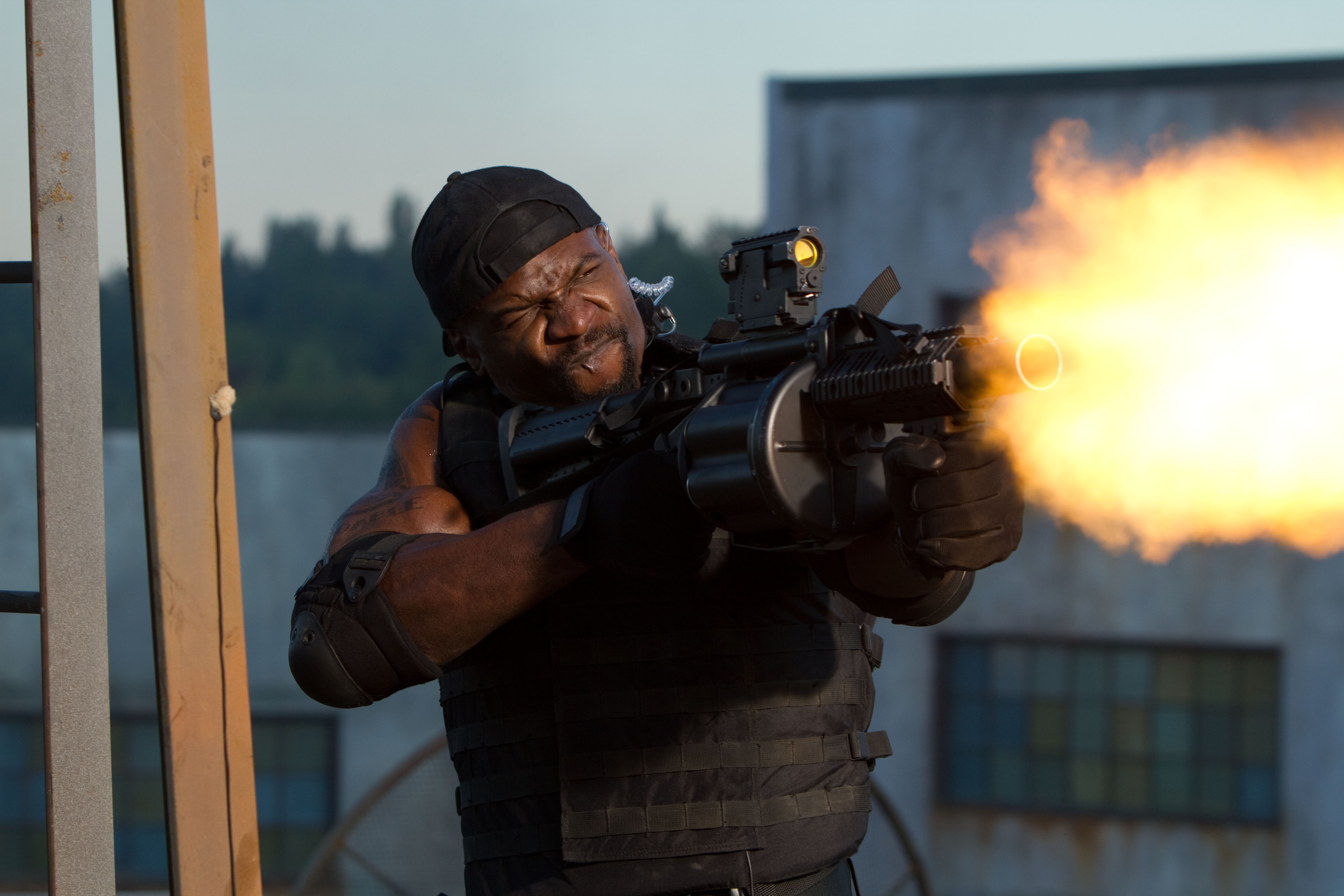 Terry Crews as Hale Caesar firing a gun HD Wallpaper