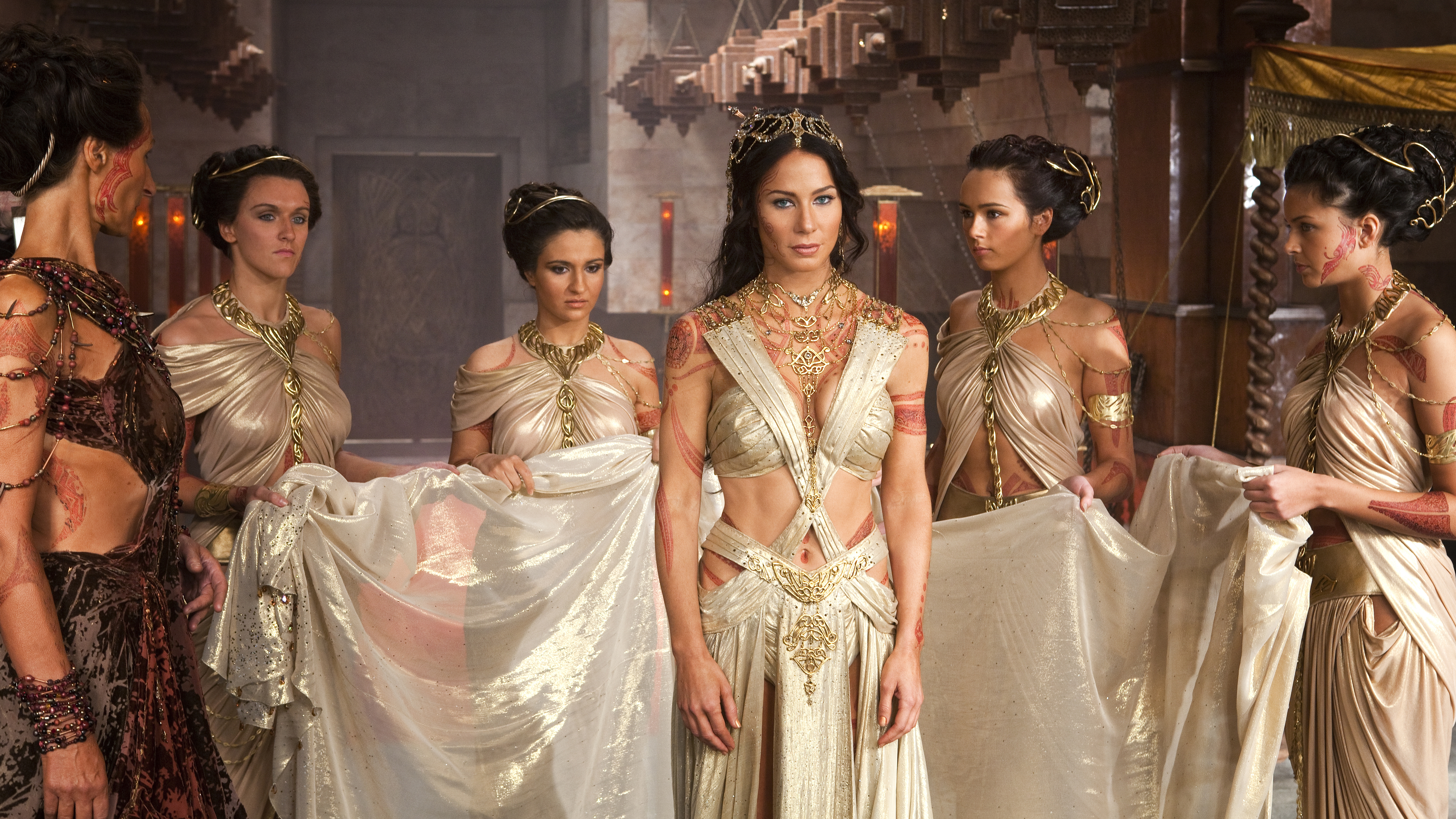 Dejah Thoris and attendants in ornate attire HD Wallpaper