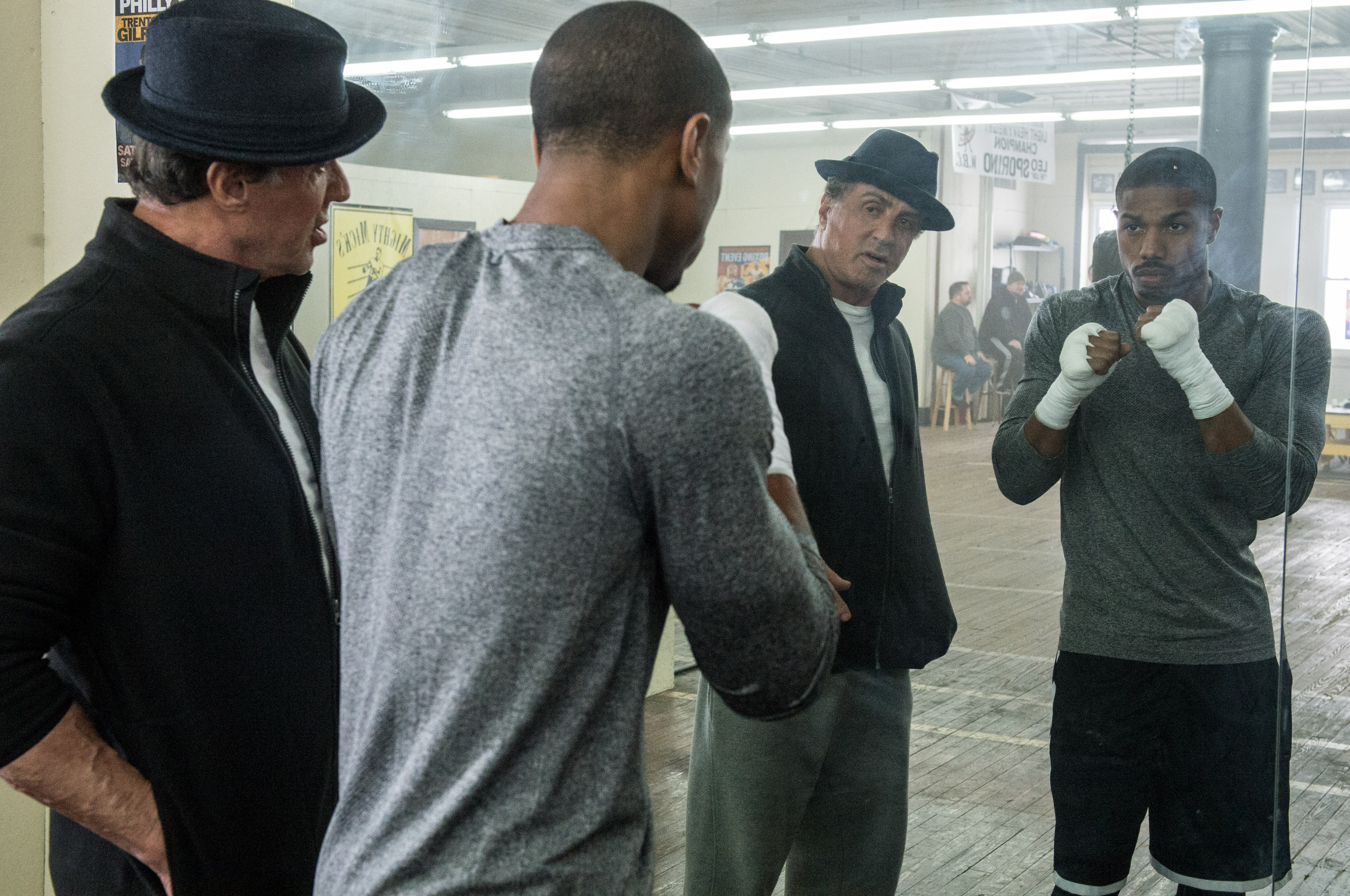 Rocky Balboa and Adonis Creed in a boxing gym HD Wallpaper