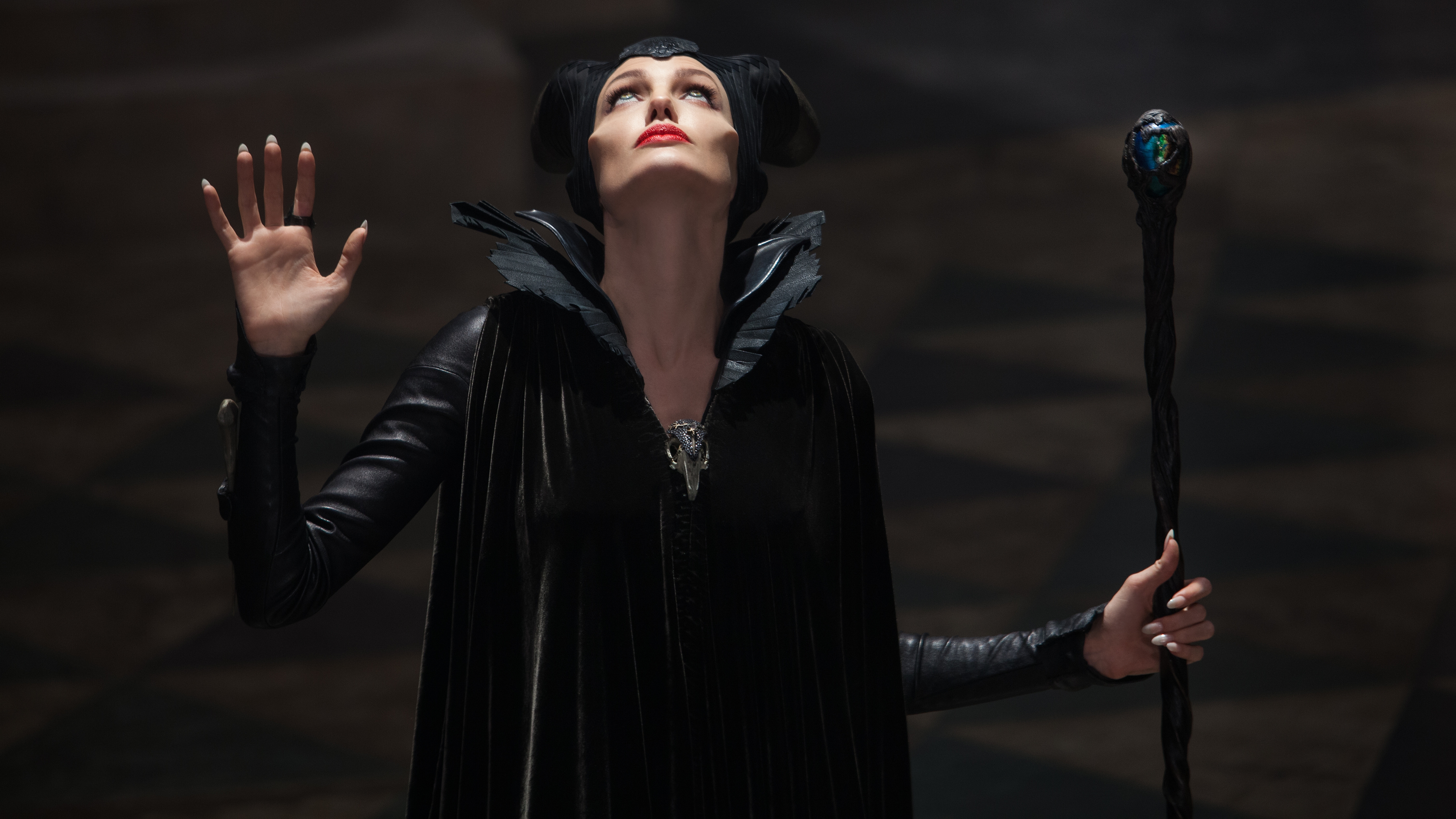 Maleficent holding a staff HD Wallpaper