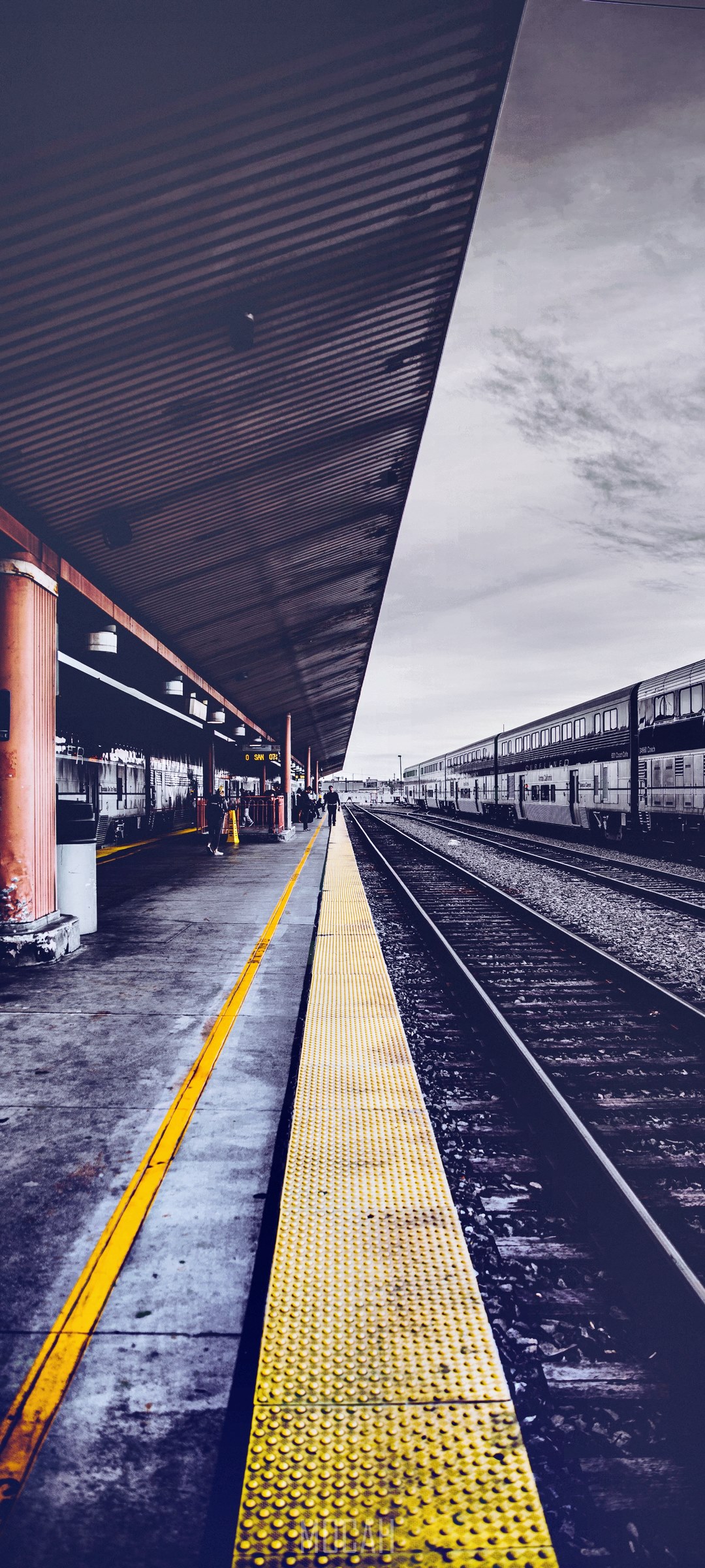 Train station platform with trains and tracks HD Phone Wallpaper