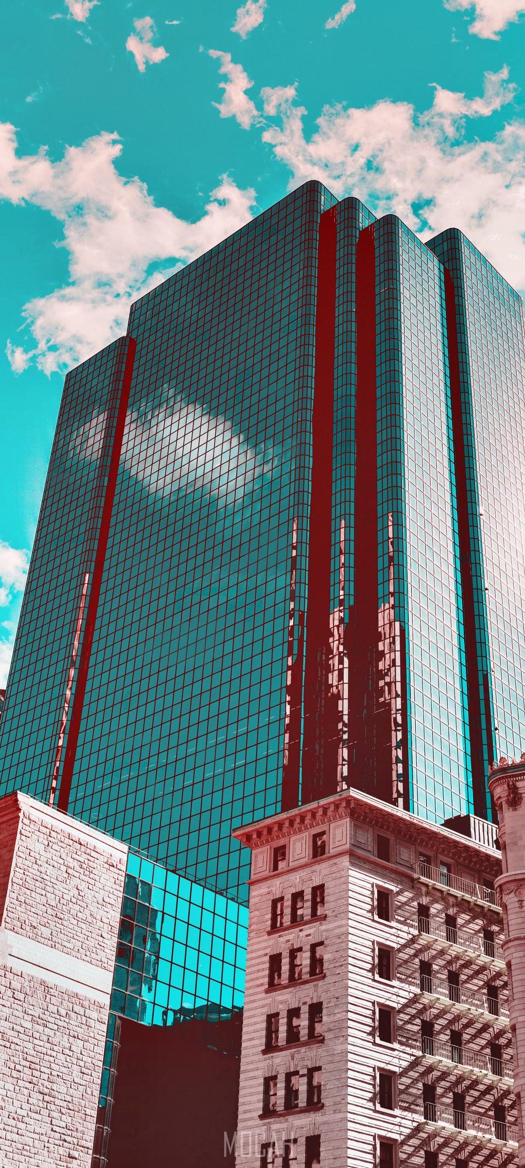 Reflective office building against a turquoise sky HD Phone Wallpaper