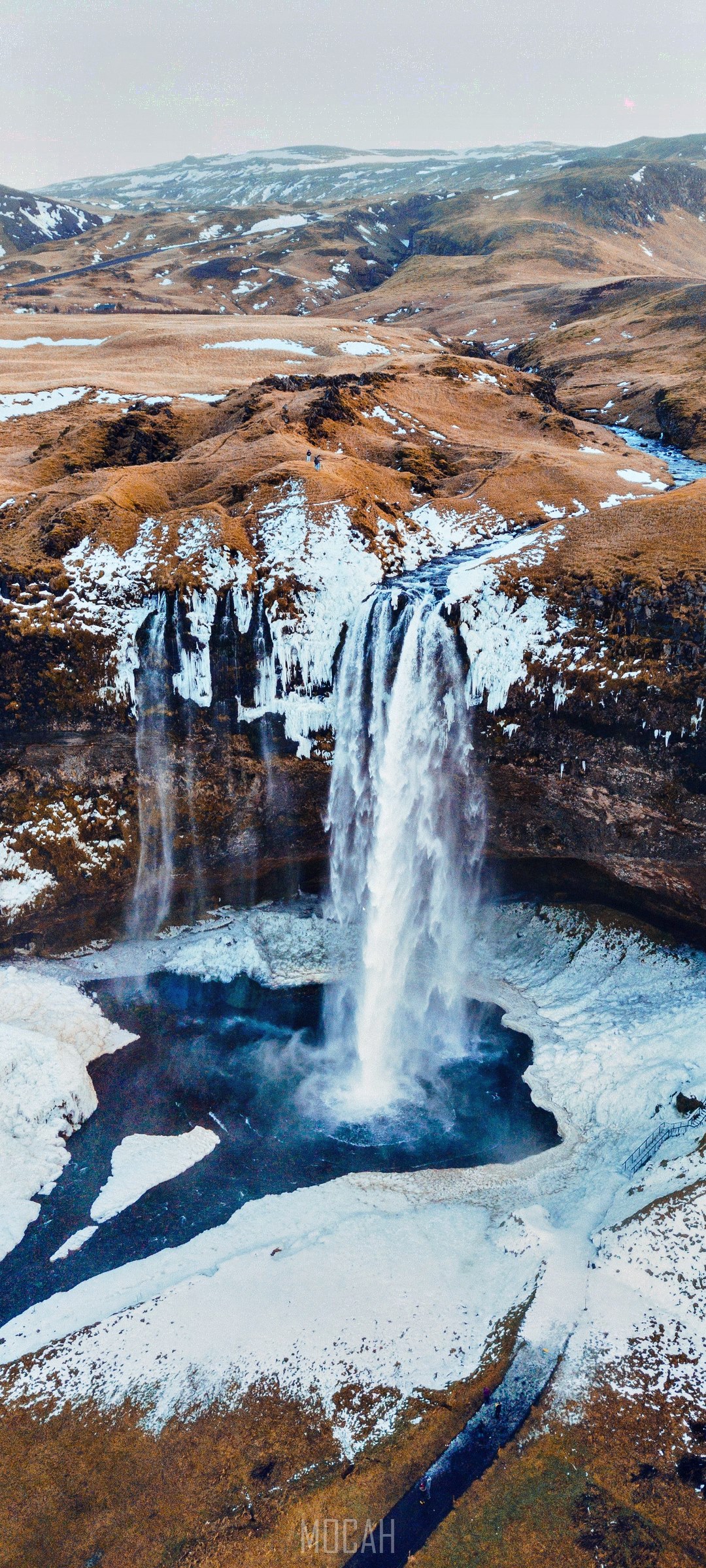Seljalandsfoss waterfall in Iceland during winter HD Phone Wallpaper