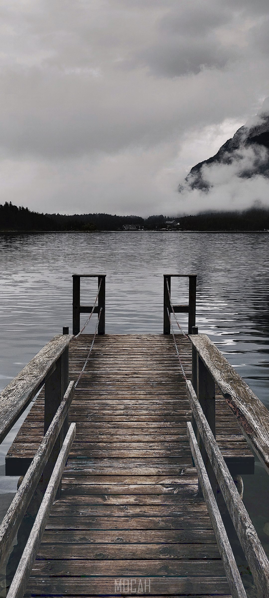 Wooden pier on a lake with misty mountains HD Phone Wallpaper