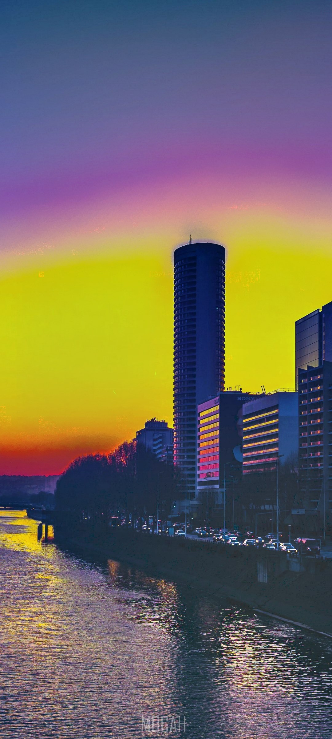 Sunset over city skyline with river HD Phone Wallpaper