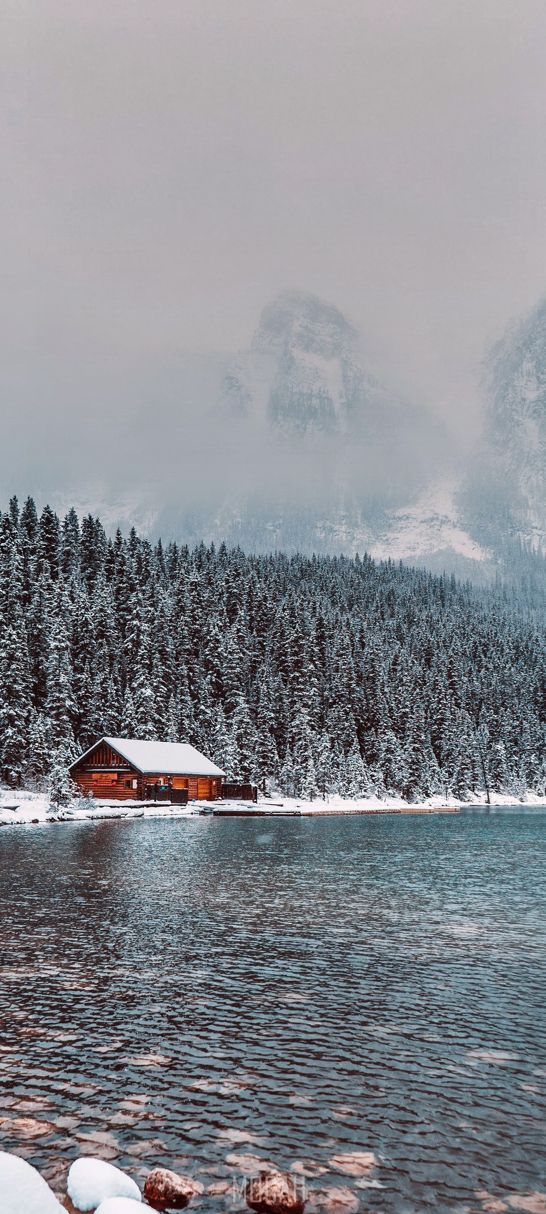Cabin by a lake in a snowy forest HD Phone Wallpaper