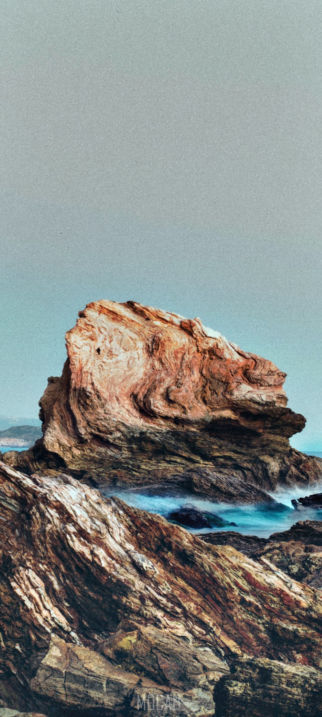 Rock formation in the ocean with waves HD Phone Wallpaper