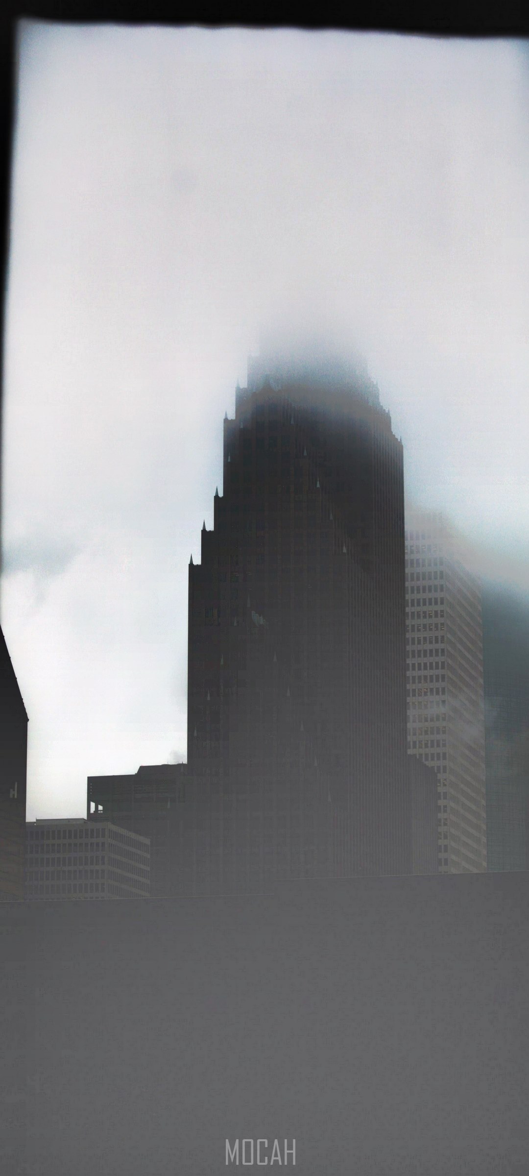 Skyscrapers shrouded in fog HD Phone Wallpaper