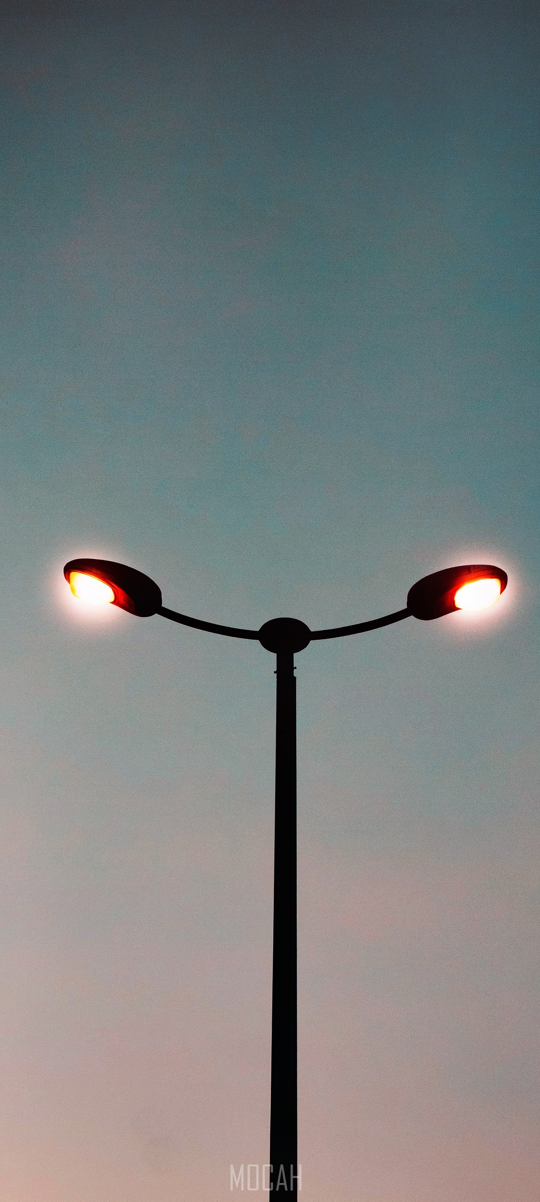 Street light with two lamps against a twilight sky HD Phone Wallpaper