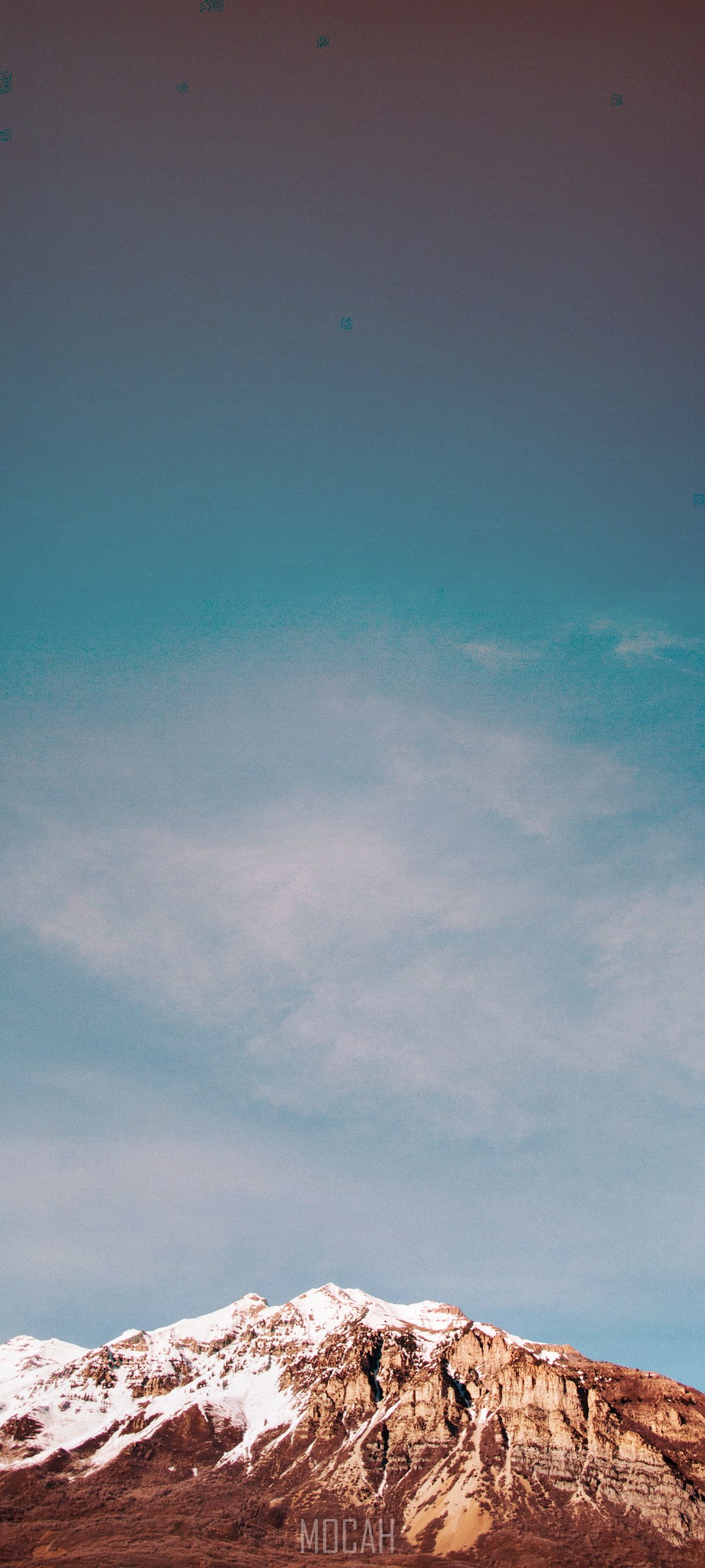 Snowy mountain peak under a blue sky HD Phone Wallpaper