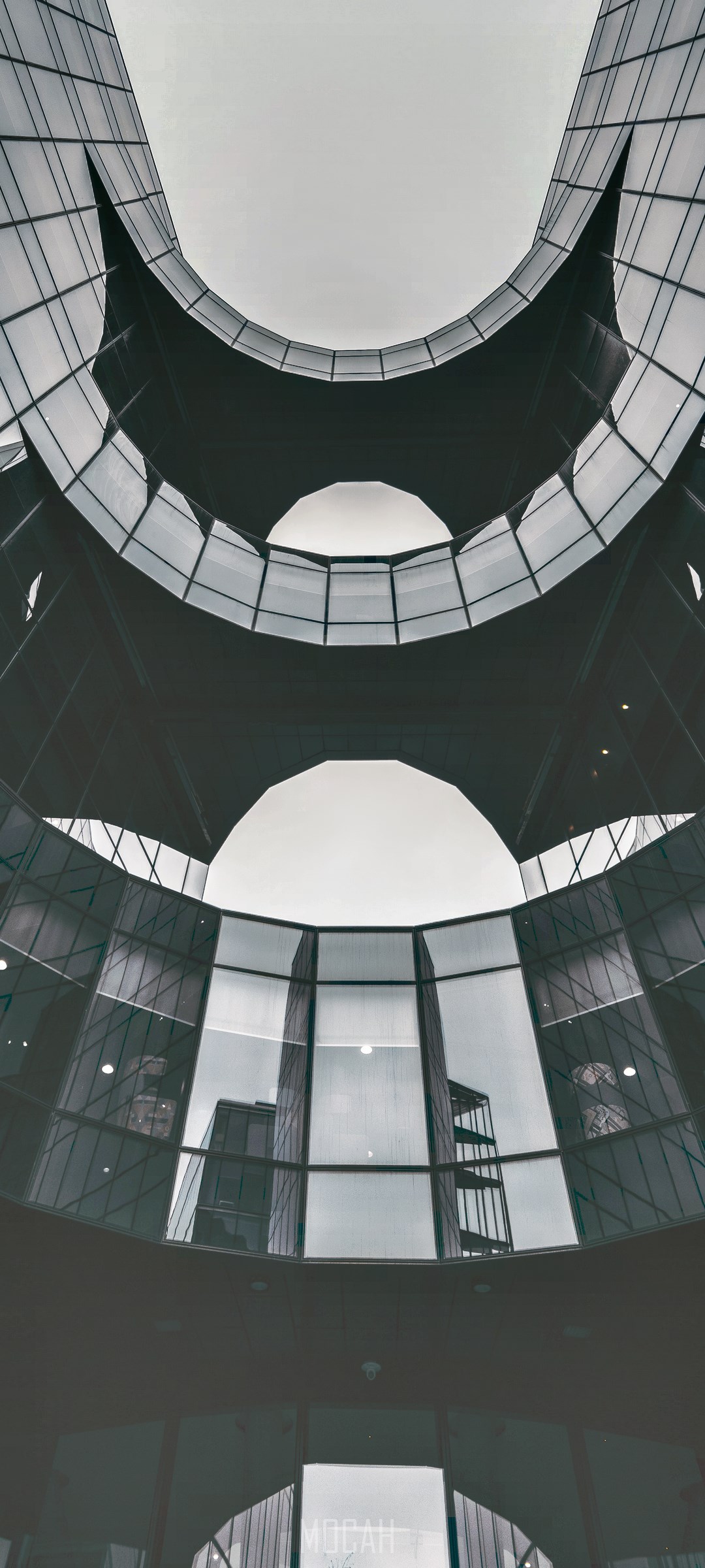 Modern architecture with glass facade and sky view HD Phone Wallpaper