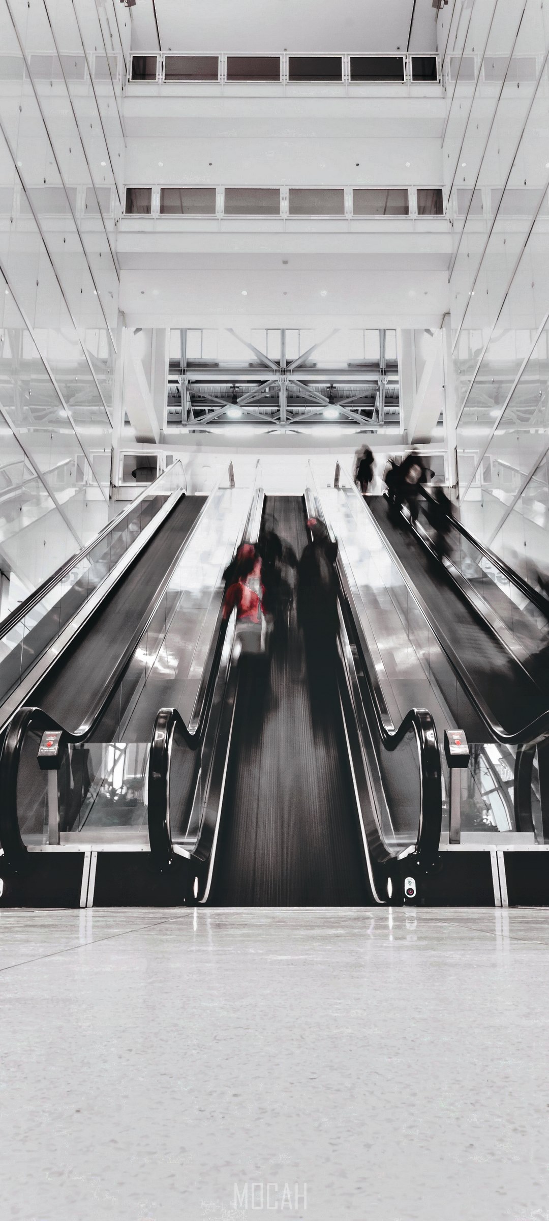 People on Escalator in Modern Building HD Phone Wallpaper