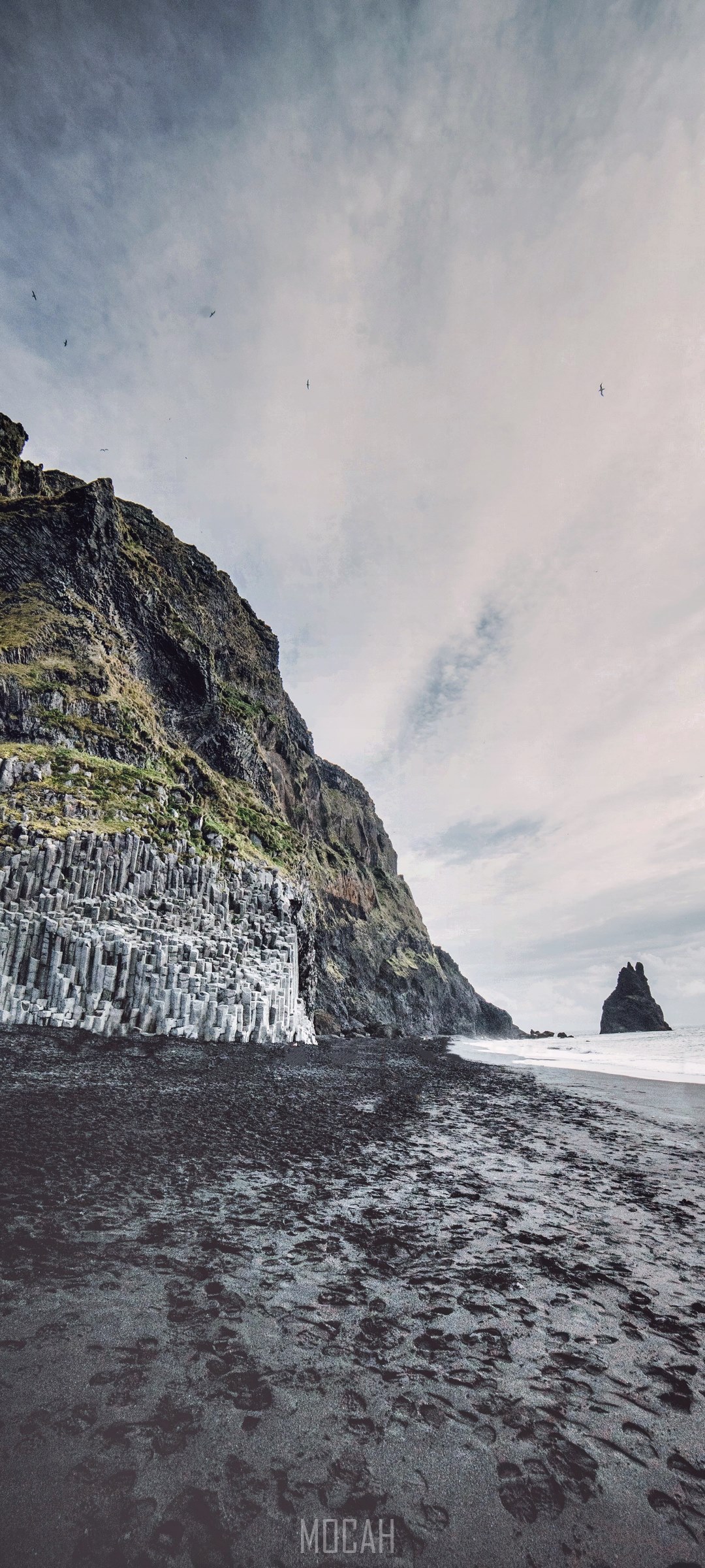 Reynisfjara black sand beach with basalt columns and sea stack HD Phone Wallpaper