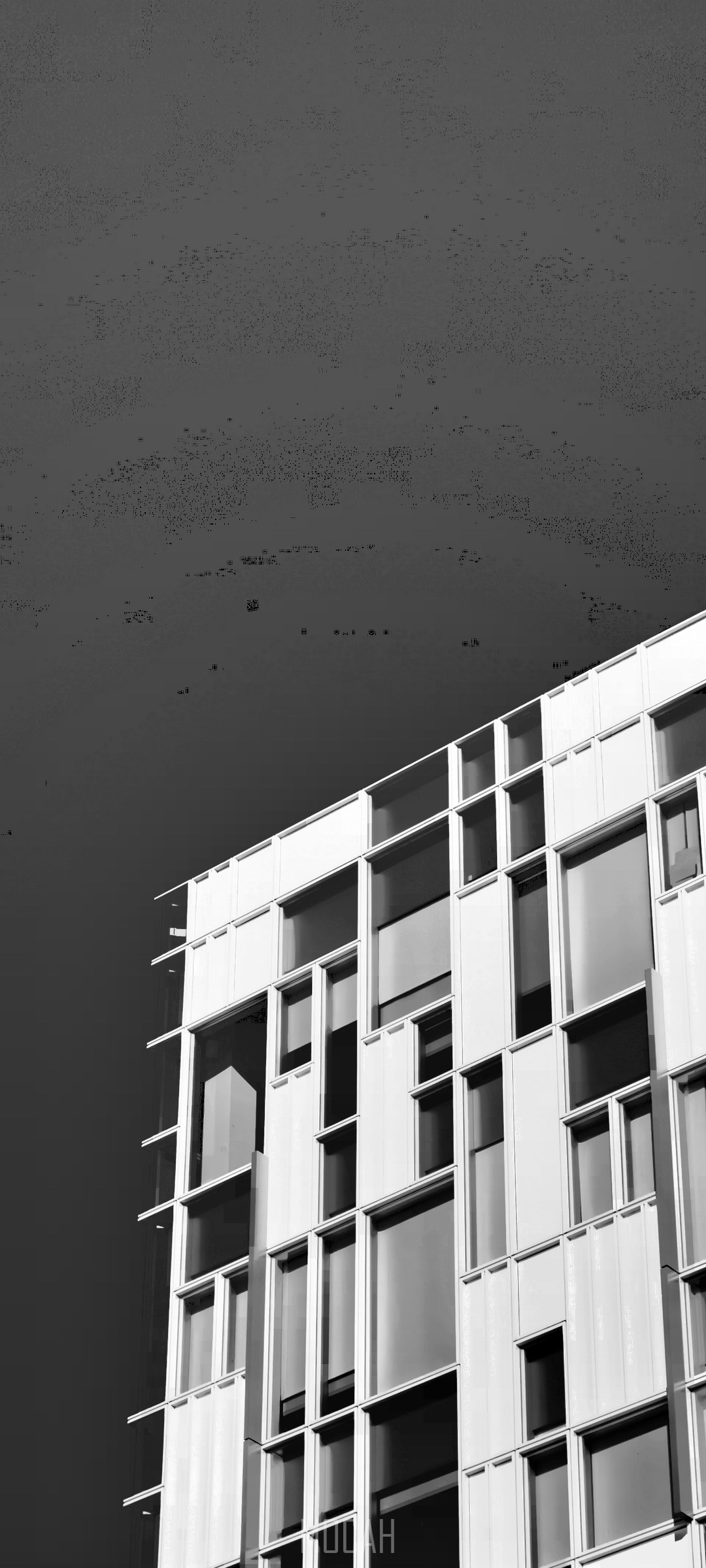 Modern building facade with geometric windows HD Phone Wallpaper