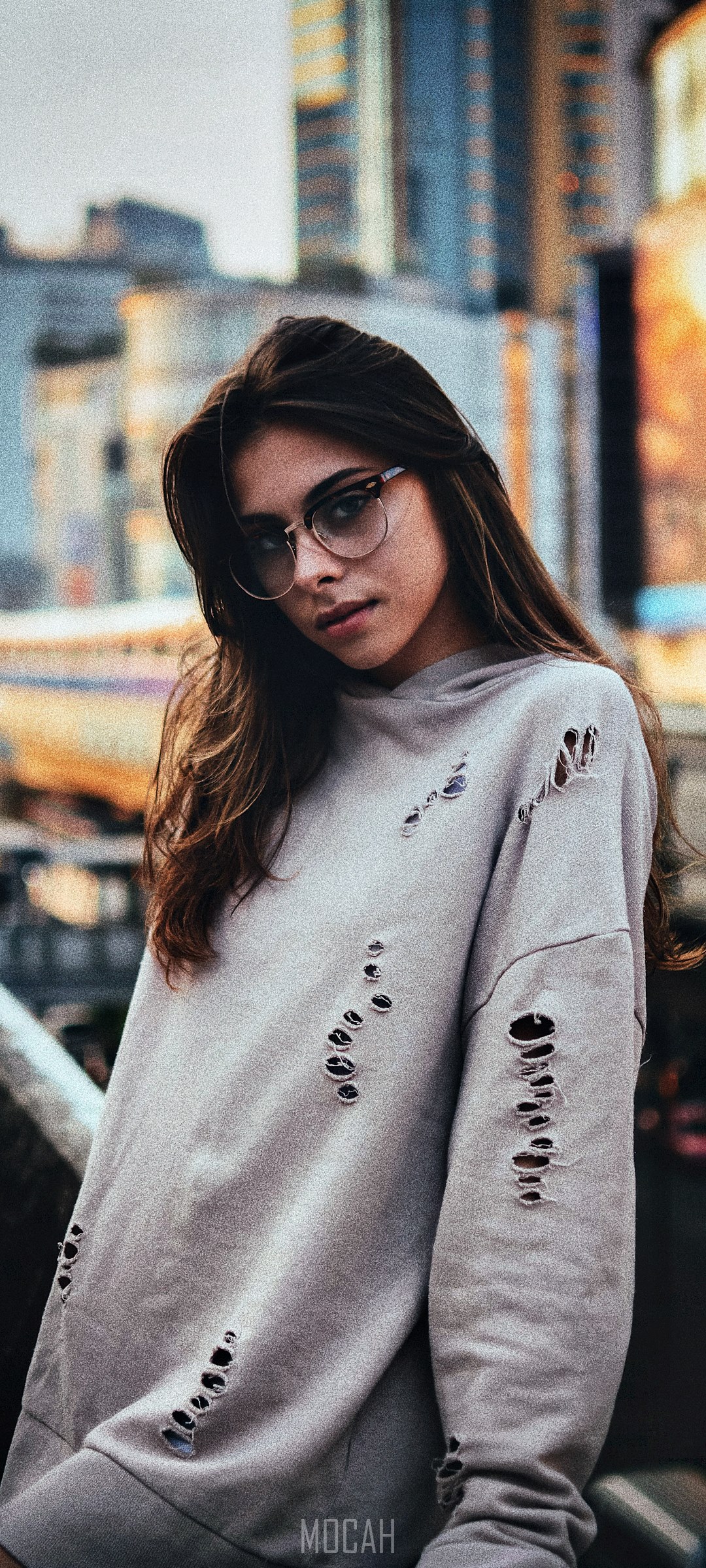 Young woman with glasses and ripped sweatshirt HD Phone Wallpaper