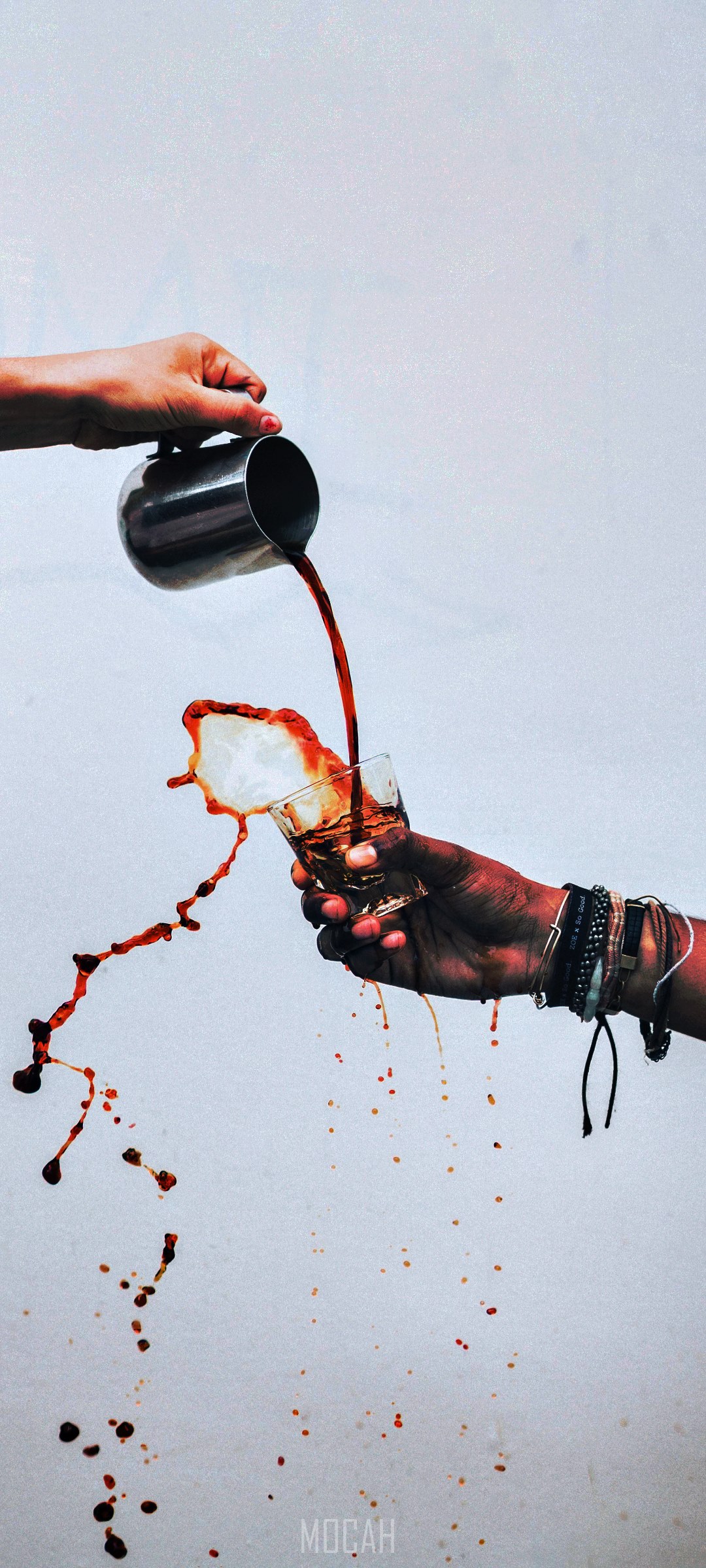 Coffee spilling from pitcher into glass HD Phone Wallpaper