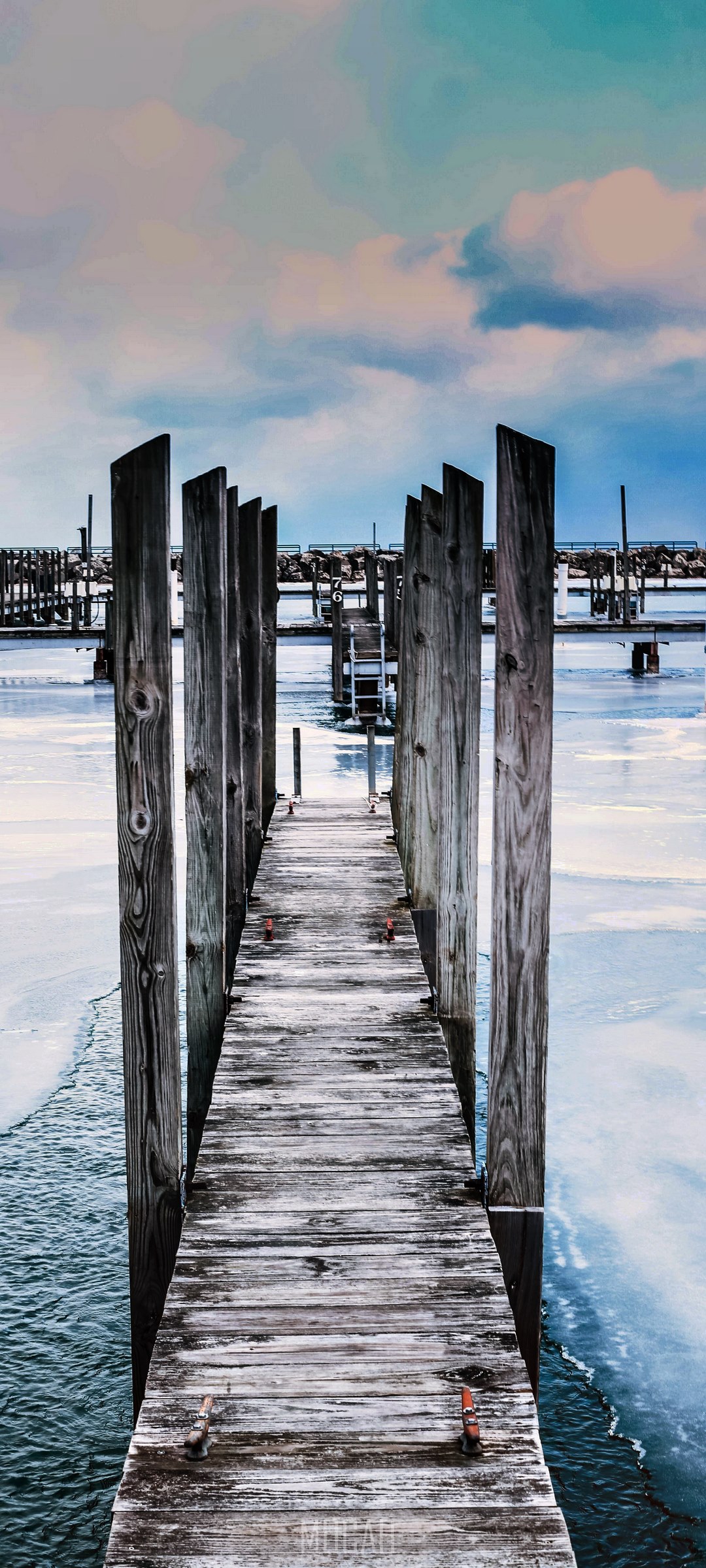 Wooden footbridge over frozen water with sky HD Phone Wallpaper