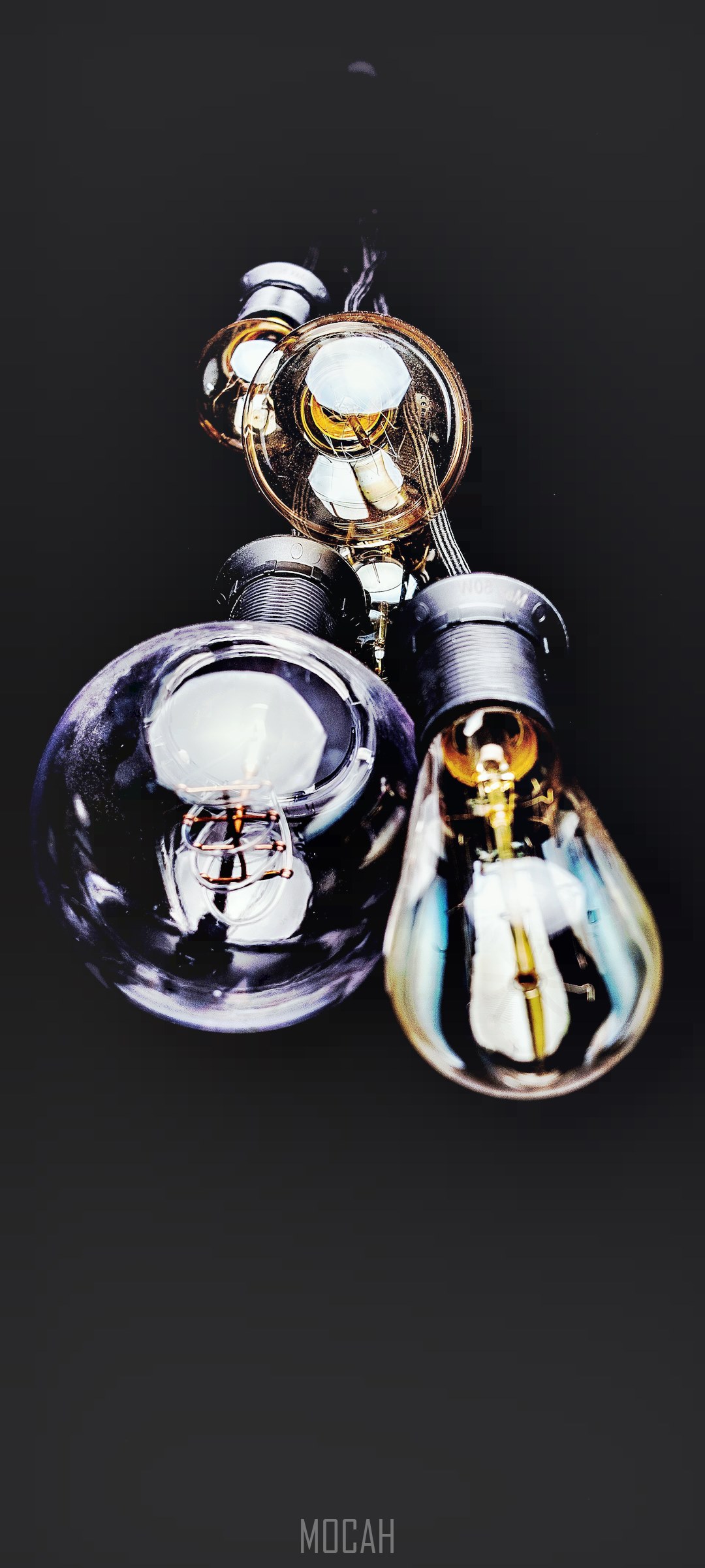 Close up of vintage light bulbs against black background HD Phone Wallpaper