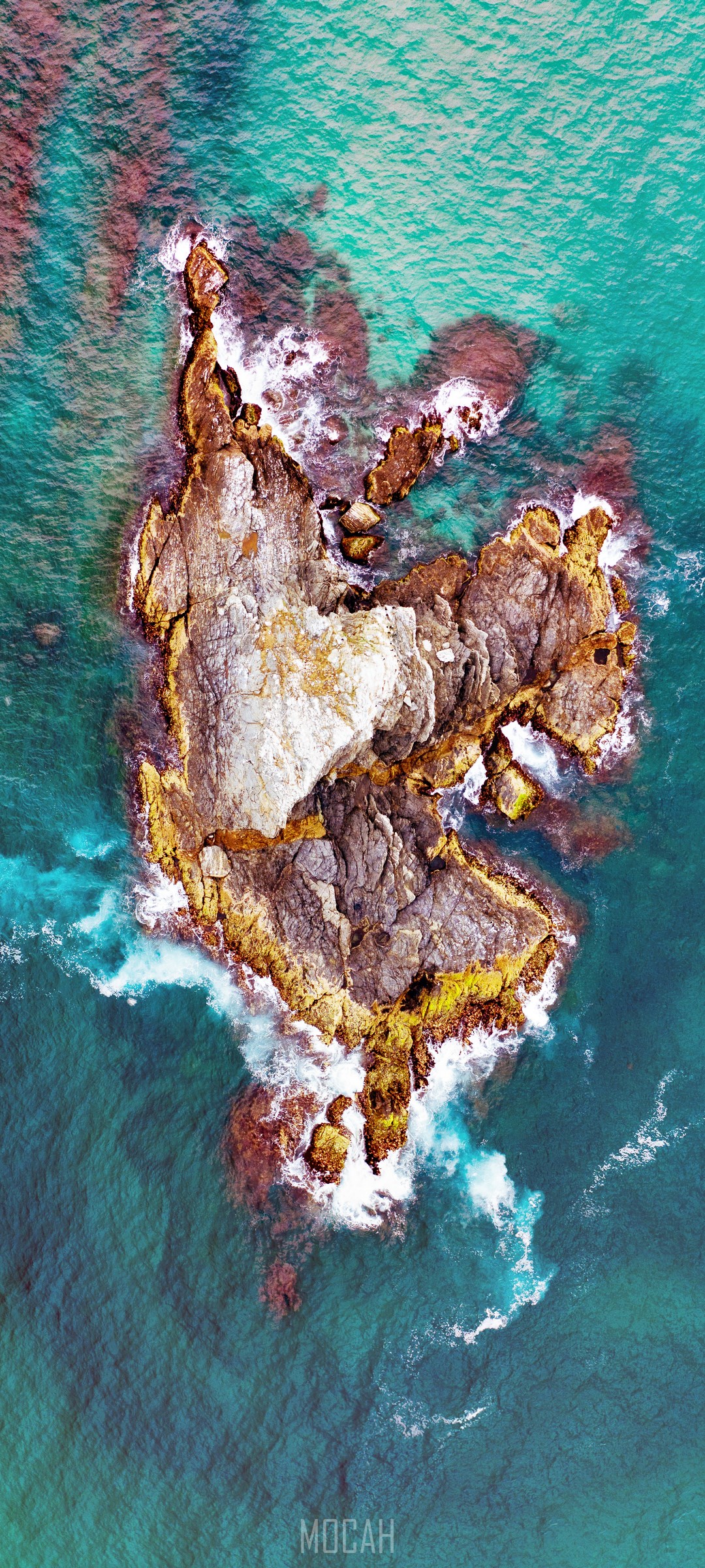 Aerial view of a rocky island in turquoise water HD Phone Wallpaper
