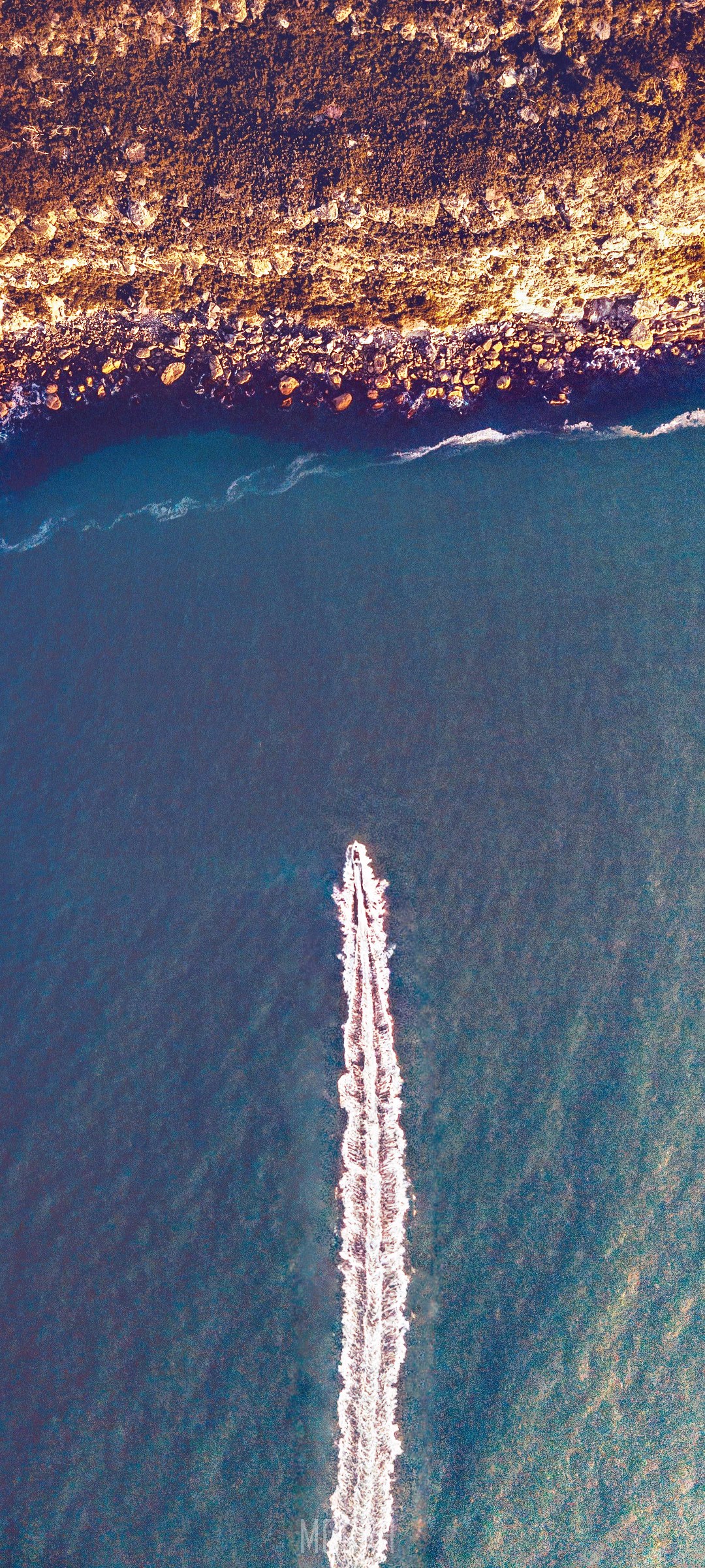 Boat leaving a wake near a rocky coastline HD Phone Wallpaper