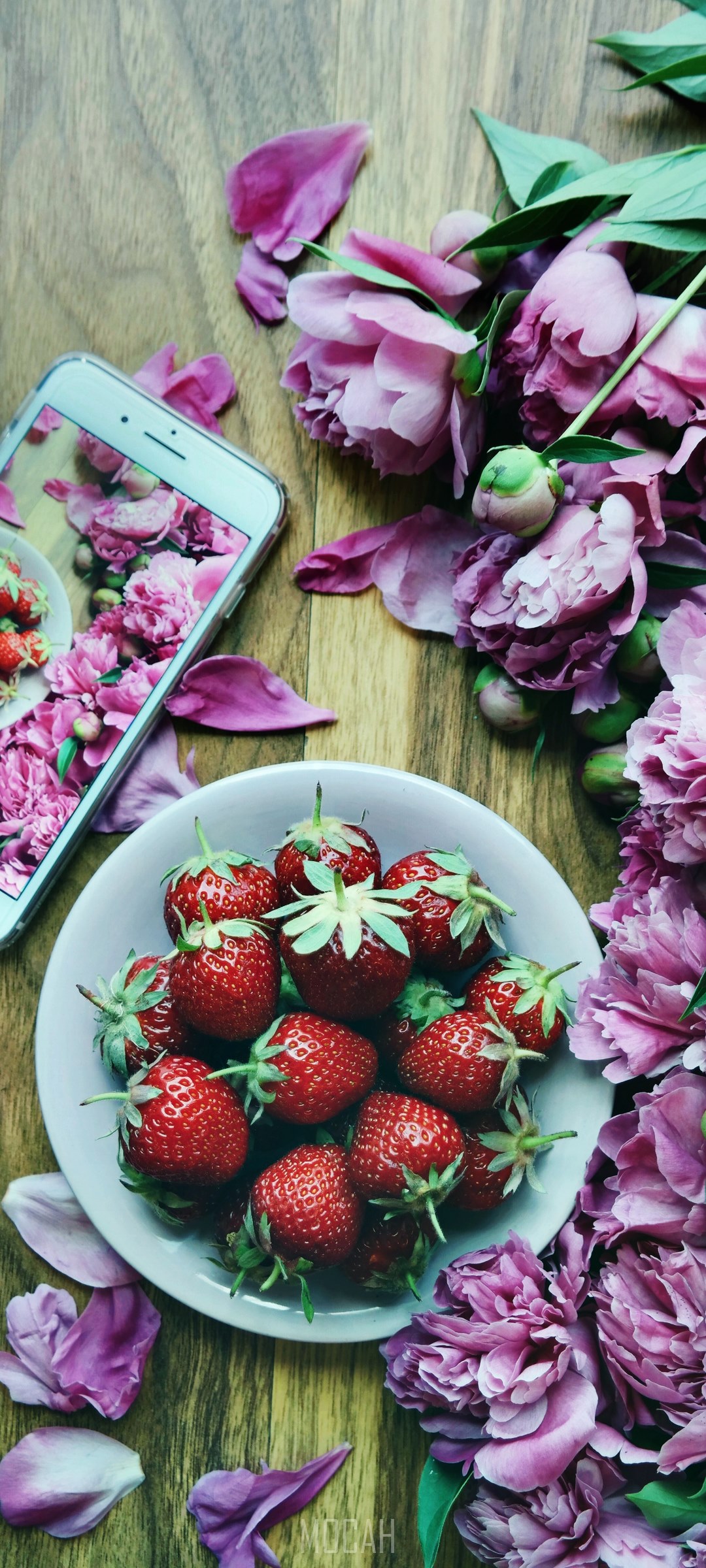 Strawberries and peonies on a wooden table HD Phone Wallpaper