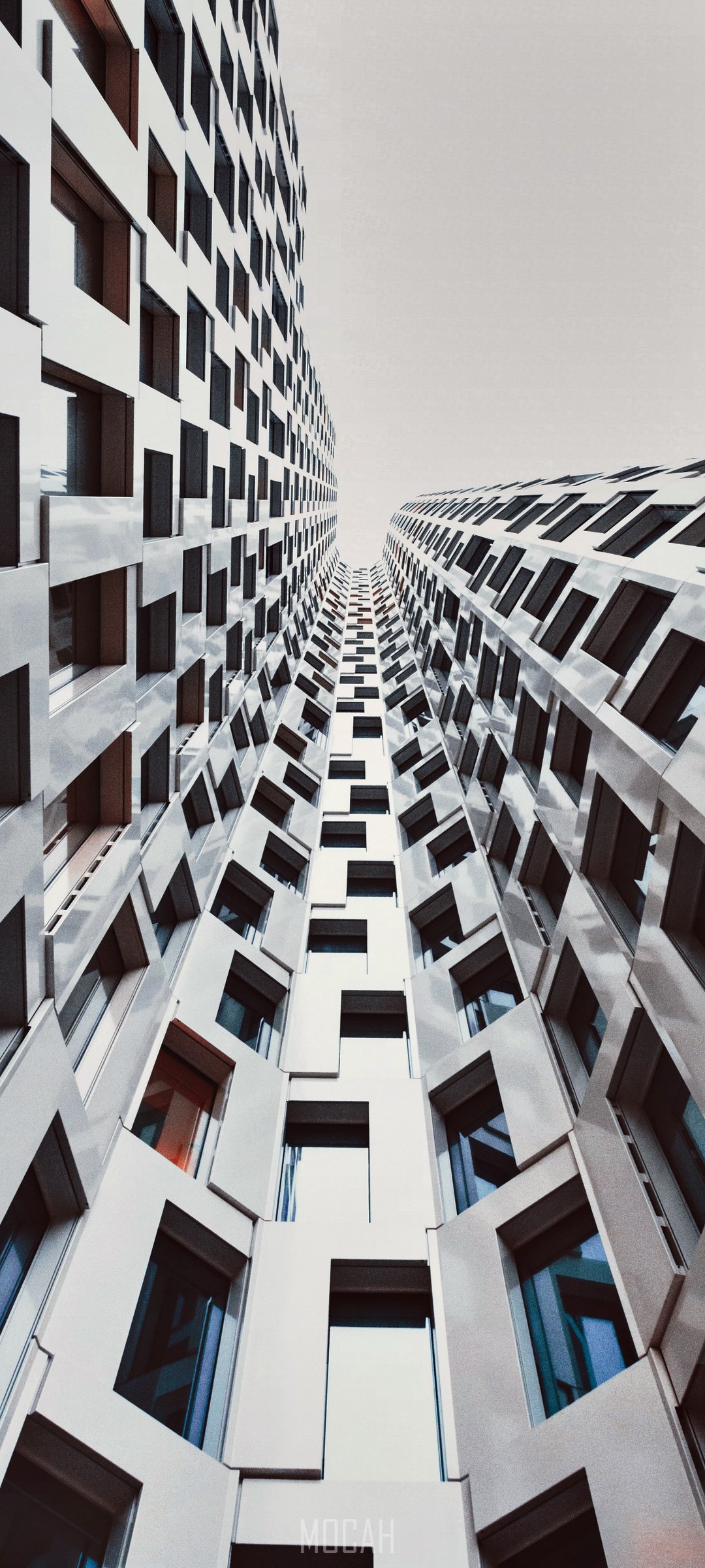 Modern Architecture with Repeating Window Patterns HD Phone Wallpaper
